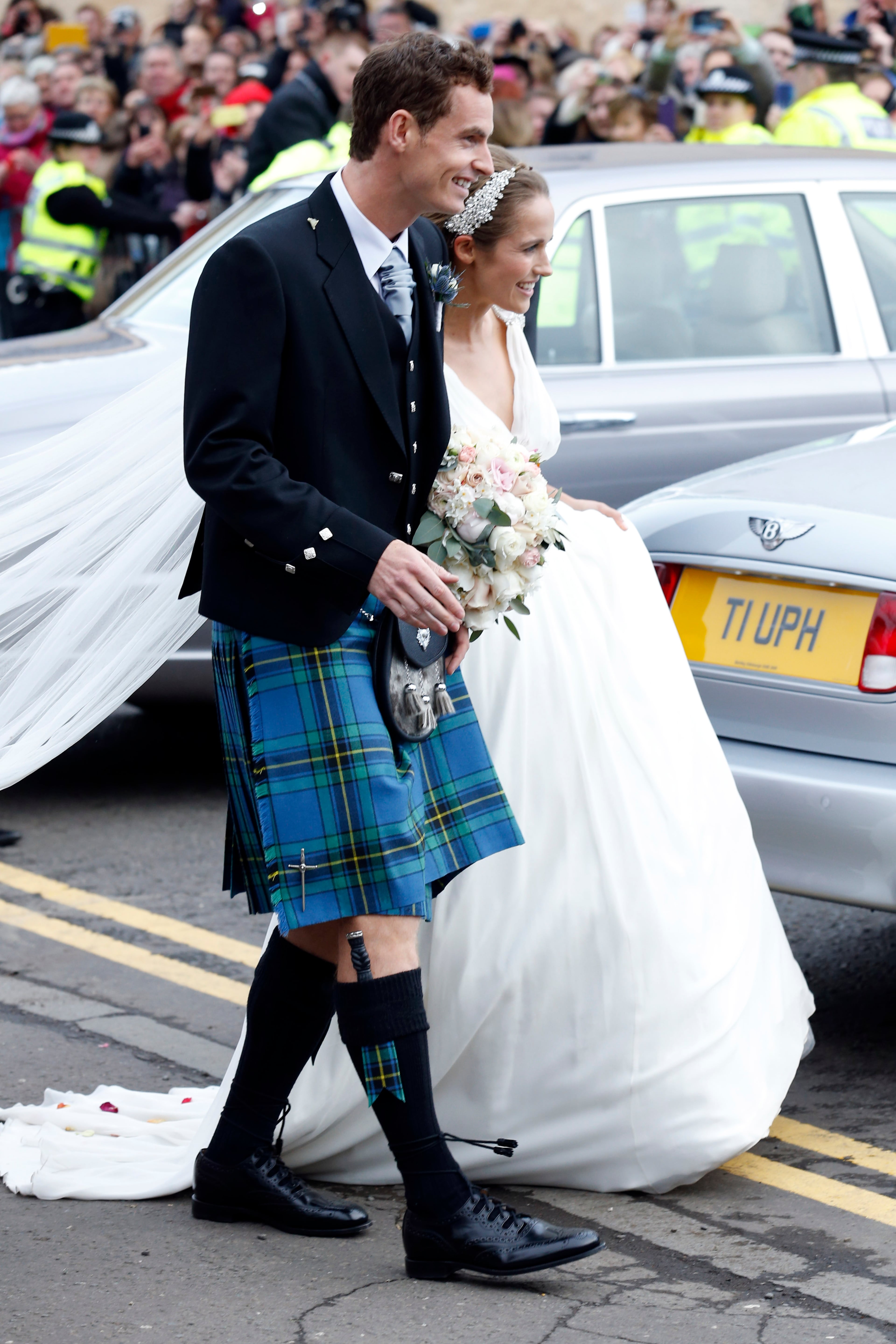 DUNBLANE, UNITED KINGDOM - APRIL 11: Andy Murray and Kim Sears leave Dunblane Cathedral after their wedding on April 11, 2015 in Dunblane, Scotland. (Photo by Alex B. Huckle/Getty Images)