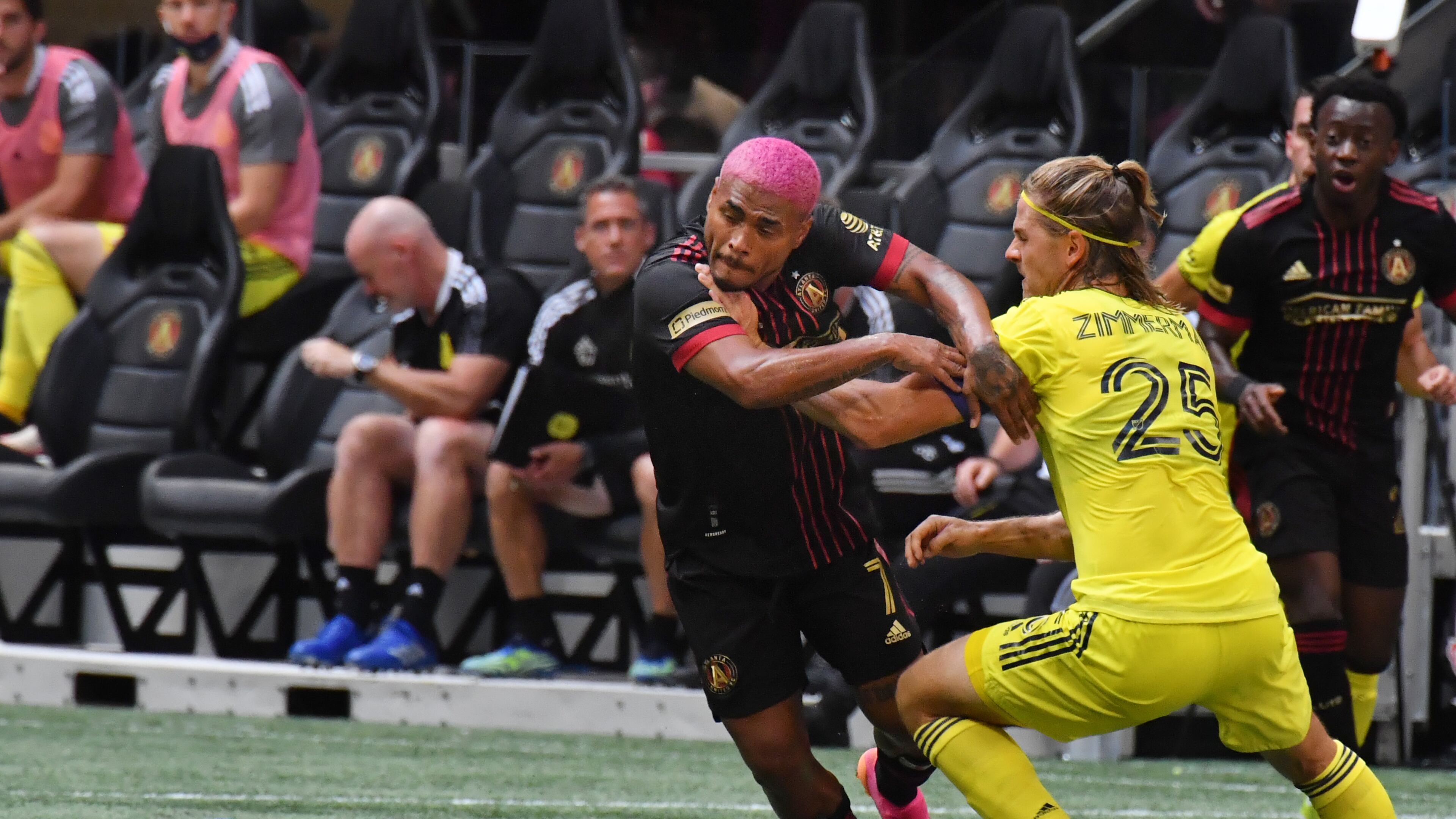 August 28, 2021 Atlanta - Atlanta United's forward Josef Martinez (7) works the ball against Nashville SC's defender Walker Zimmerman (25) during the first half in a MLS soccer match at at Mercedes-Benz Stadium in Atlanta on Saturday, August 28, 2021. (Hyosub Shin / Hyosub.Shin@ajc.com)