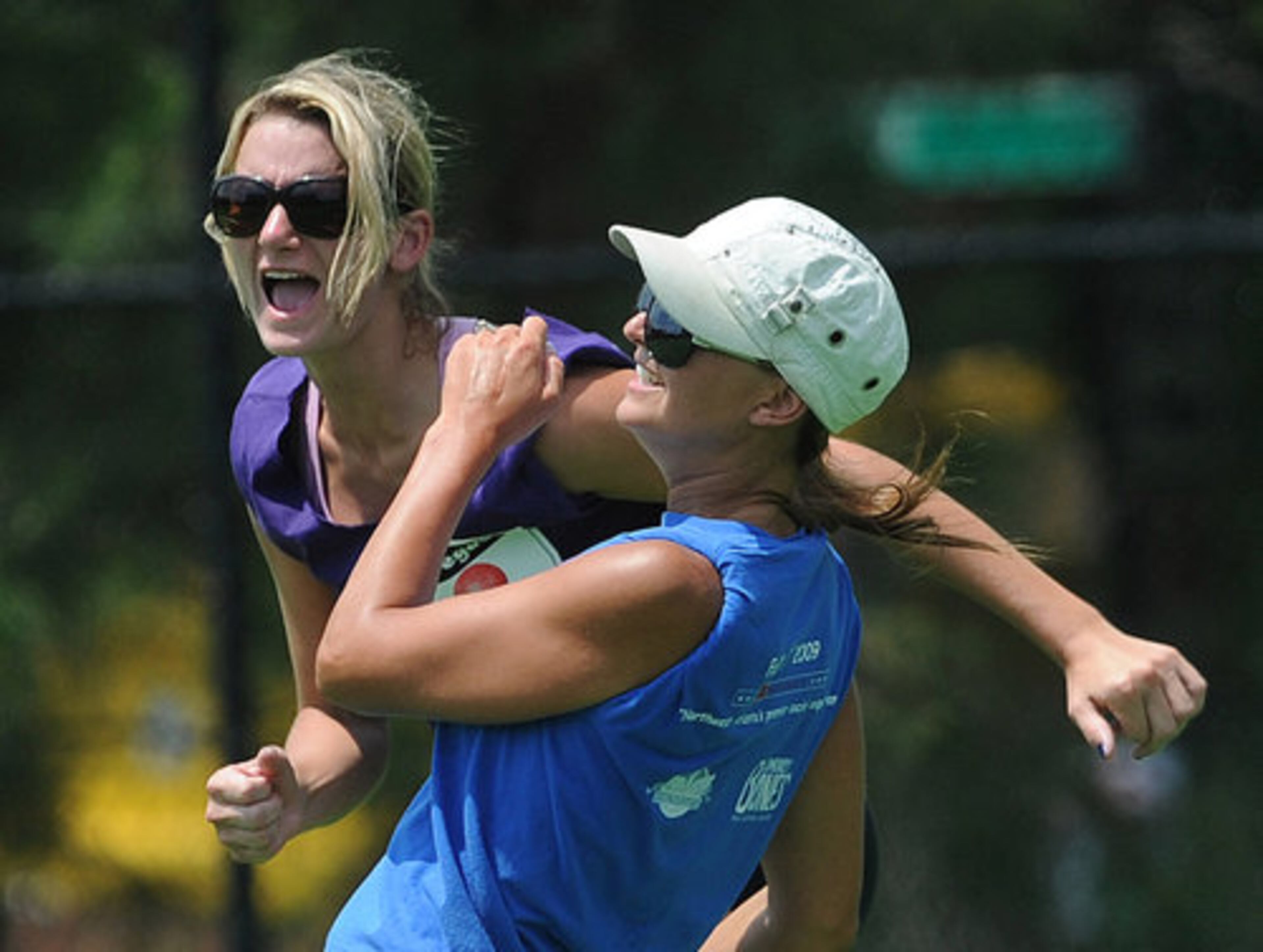 Erica Sellers, Jacksonville, Fla., (right) collides with Bethany Schebler, Marietta, at second base.