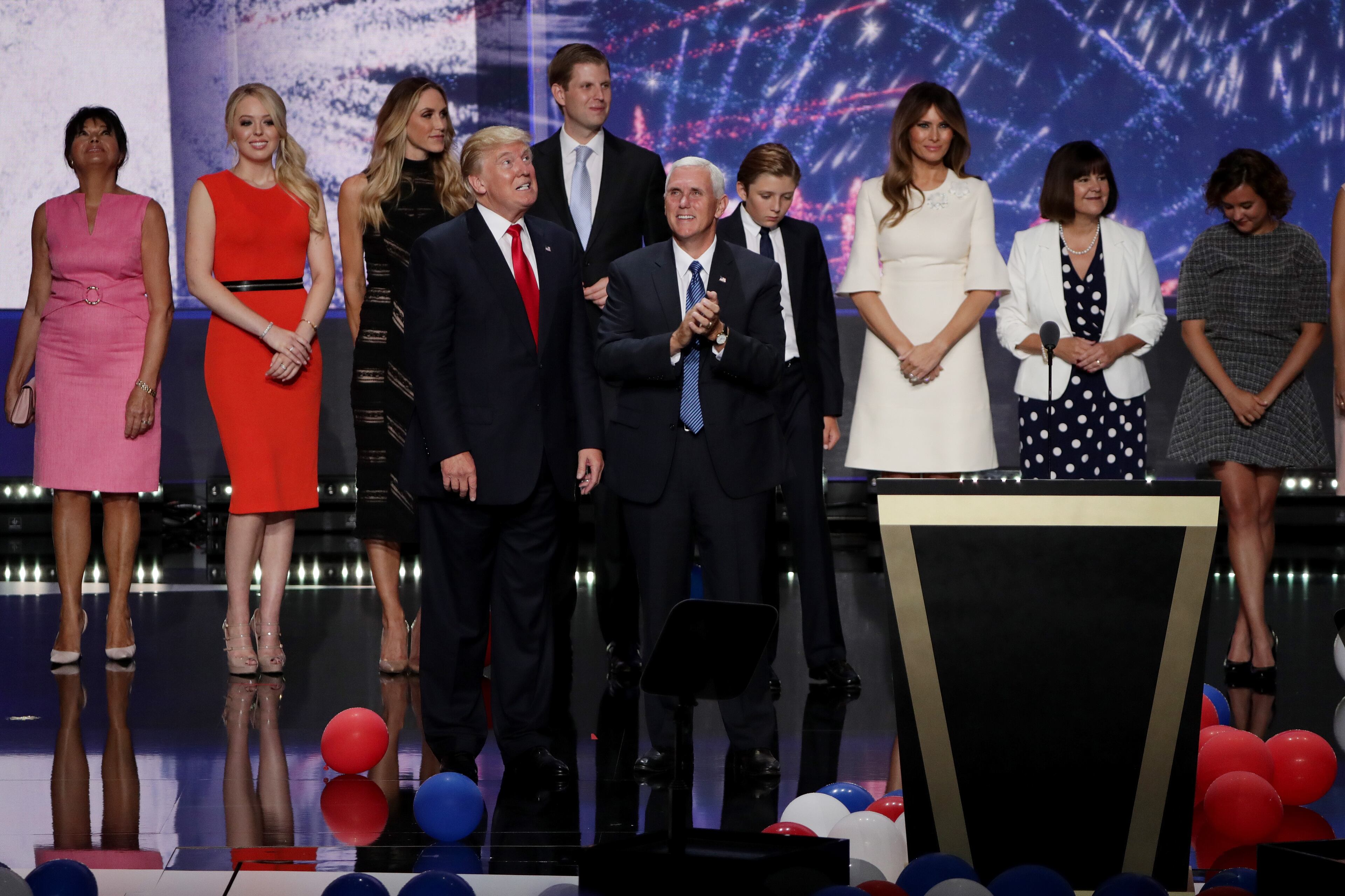 Republican presidential candidate Donald Trump (Center-L) and Republican vice presidential candidate Mike Pence (Center-R) stand with their families at the end of the Republican National Convention on July 21, 2016 at the Quicken Loans Arena in Cleveland, Ohio. (Photo by Alex Wong/Getty Images)