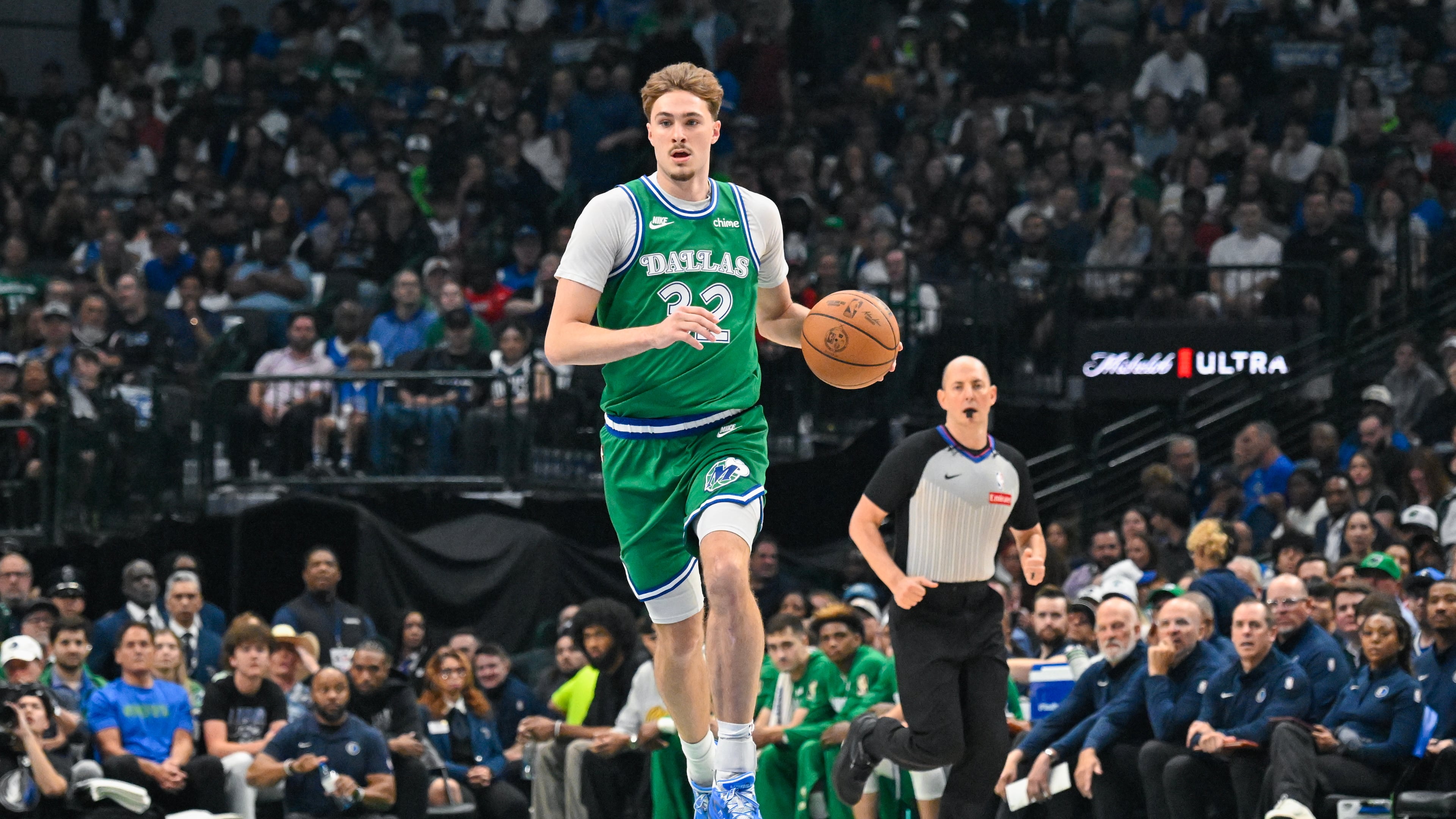 Dallas Mavericks' Cooper Flagg brings the ball up court during an NBA basketball game against the Chicago Bulls Sunday, April 12, 2026, in Dallas. (AP Photo/Albert Pena)