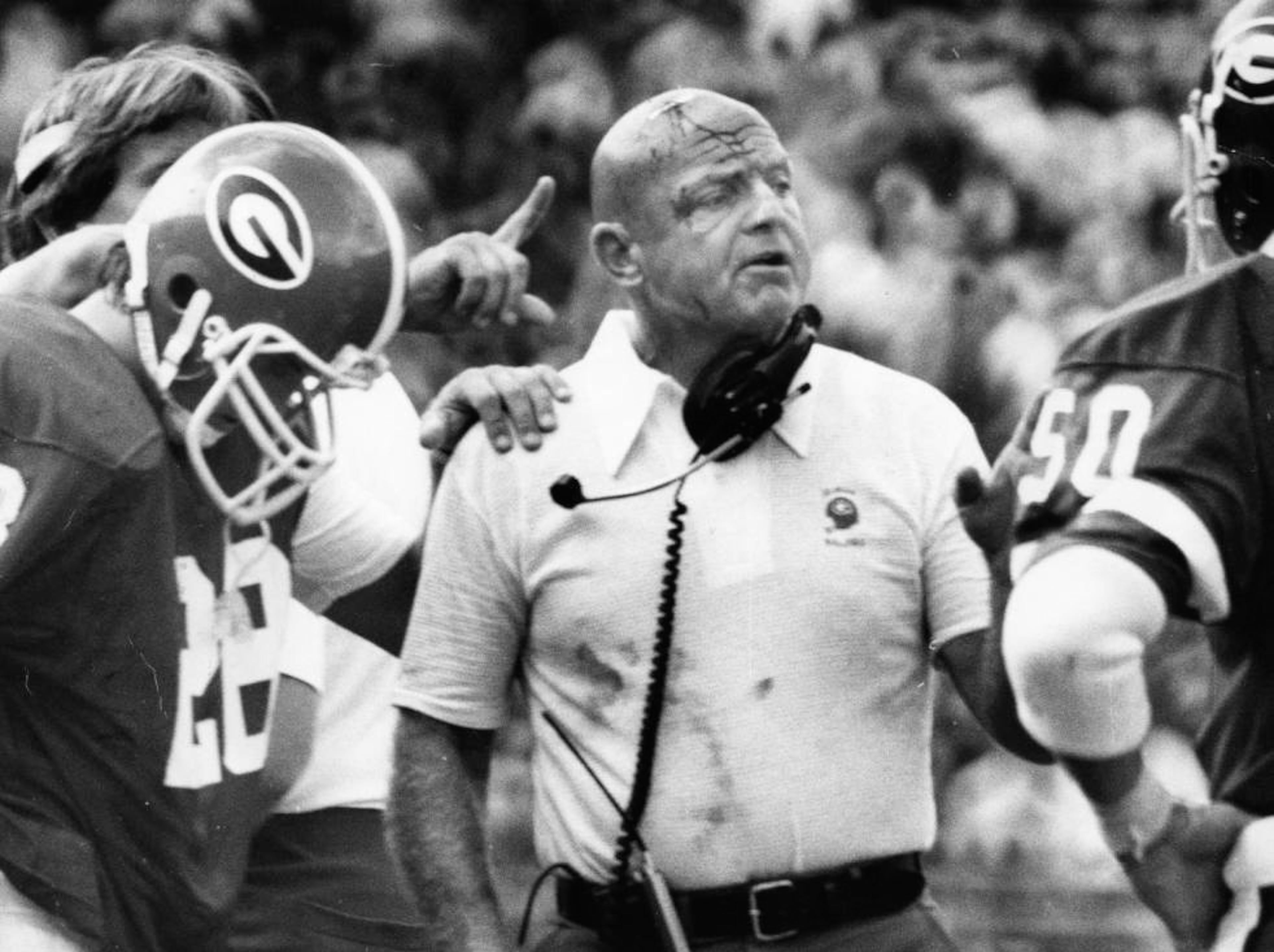 Defensive coordinator Erk Russell covered in blood after head-butting his players, 1979