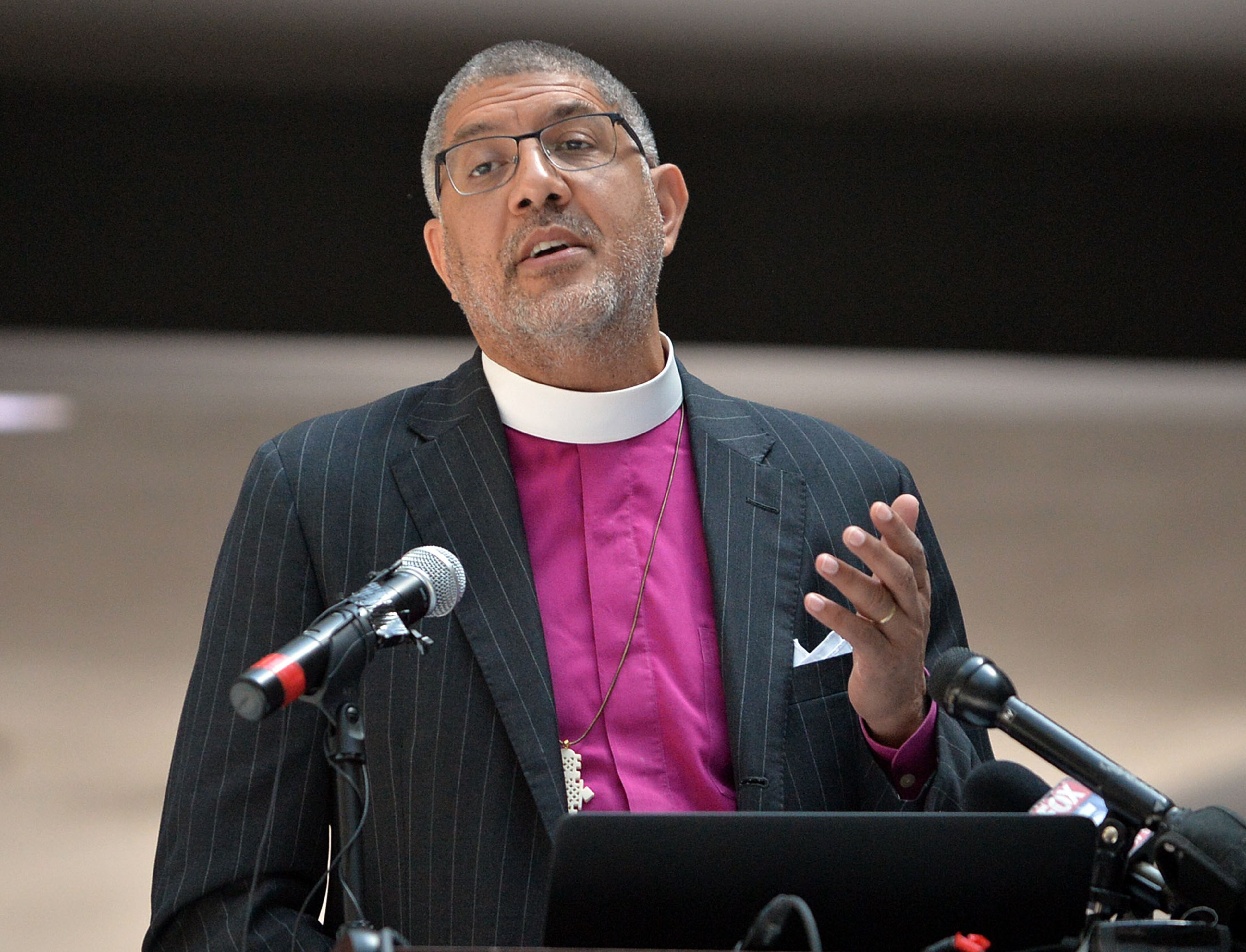 The Right Rev. Robert C. Wright of the Episcopal Diocese of Atlanta delivers the keynote address. The Atlanta Police Department recognized 82 fallen officers during the 24th Annual Police Memorial Service at the Atlanta City Hall atrium, Tuesday, May 5, 2015. Additional speakers included Atlanta Police Chief George N. Turner, Michael Geisler, Chief Operating Officer, City Council President Ceasar C. Mitchell and Council member C.T. Martin, Public Safety Chair. KENT D. JOHNSON /KDJOHNSON@AJC.COM