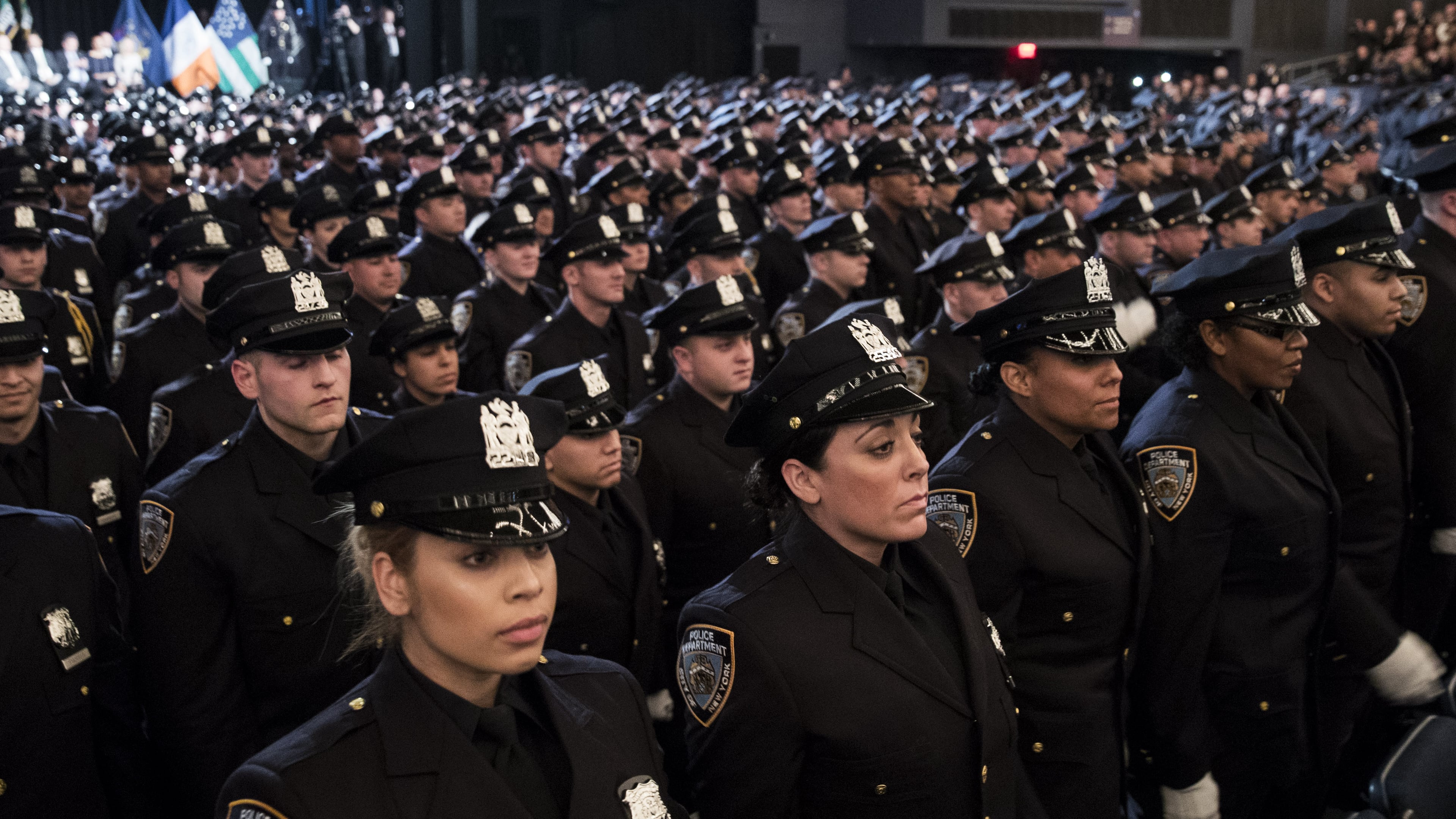 NEW YORK, NY - MARCH 30: The newest members of the New York City Police Department (NYPD) attend their police academy graduation ceremony at the Theater at Madison Square Garden, March 30, 2017 in New York City. Over 600 new officers were sworn in during the ceremony. (Photo by Drew Angerer/Getty Images)