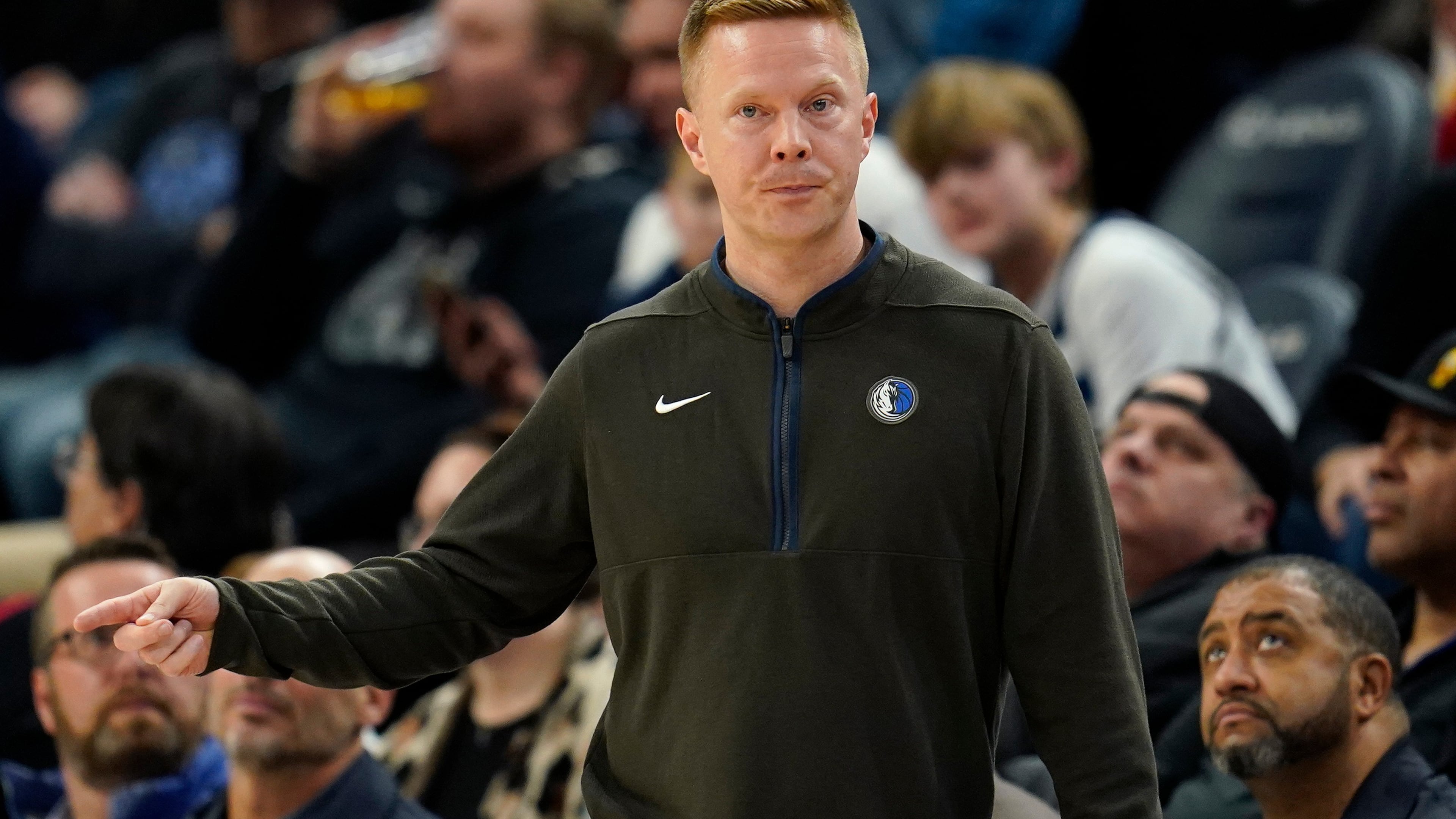 FILE - Dallas Mavericks assistant coach Sean Sweeney directs the team during the second half of an NBA basketball game against the Minnesota Timberwolves, Dec. 19, 2022, in Minneapolis. (AP Photo/Abbie Parr, File)