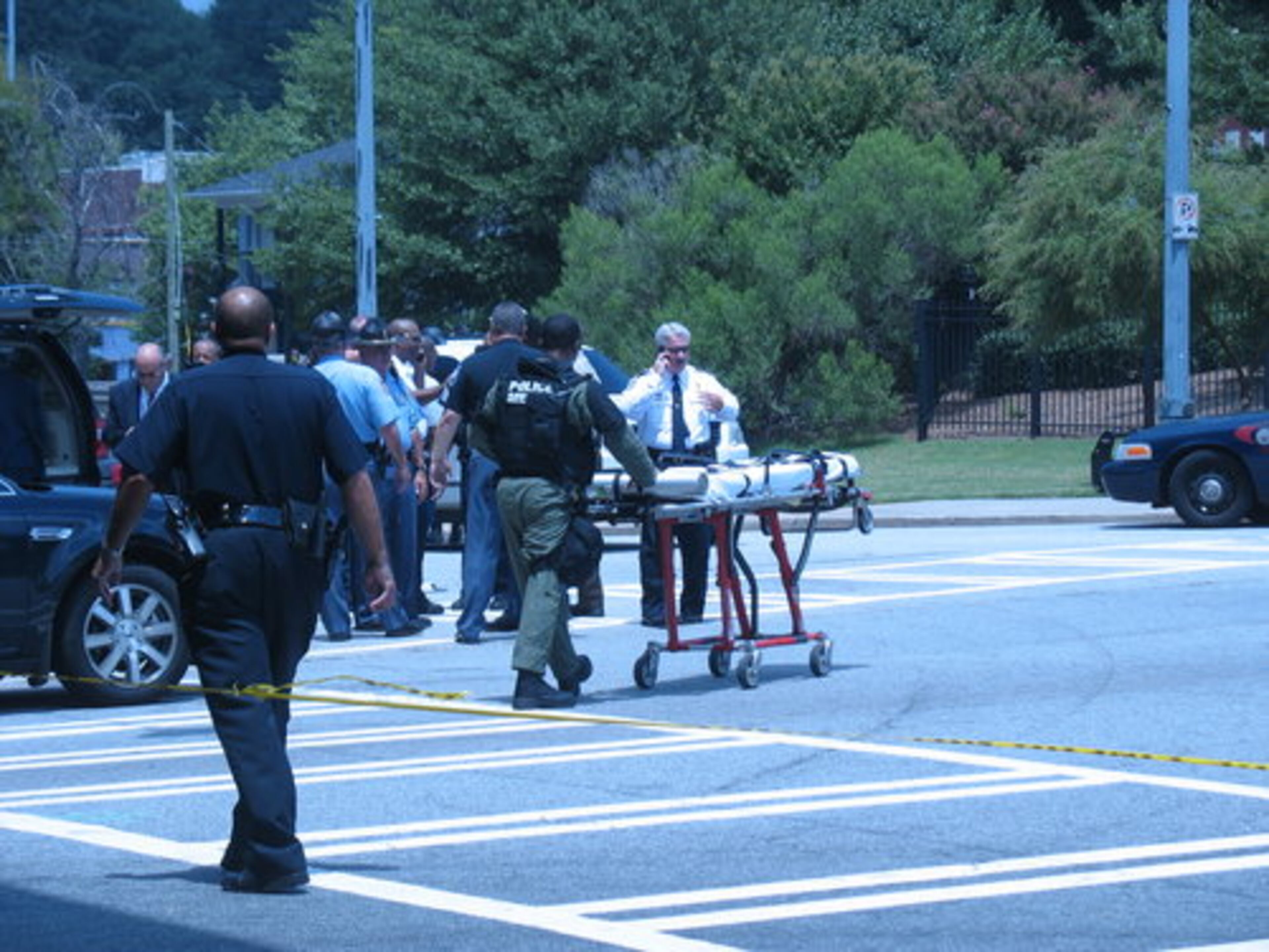 One suspect was in custody and another was still at large, WSB reported. The photos were shot looking east on Edgewood Avenue from beneath the Downtown Connector.