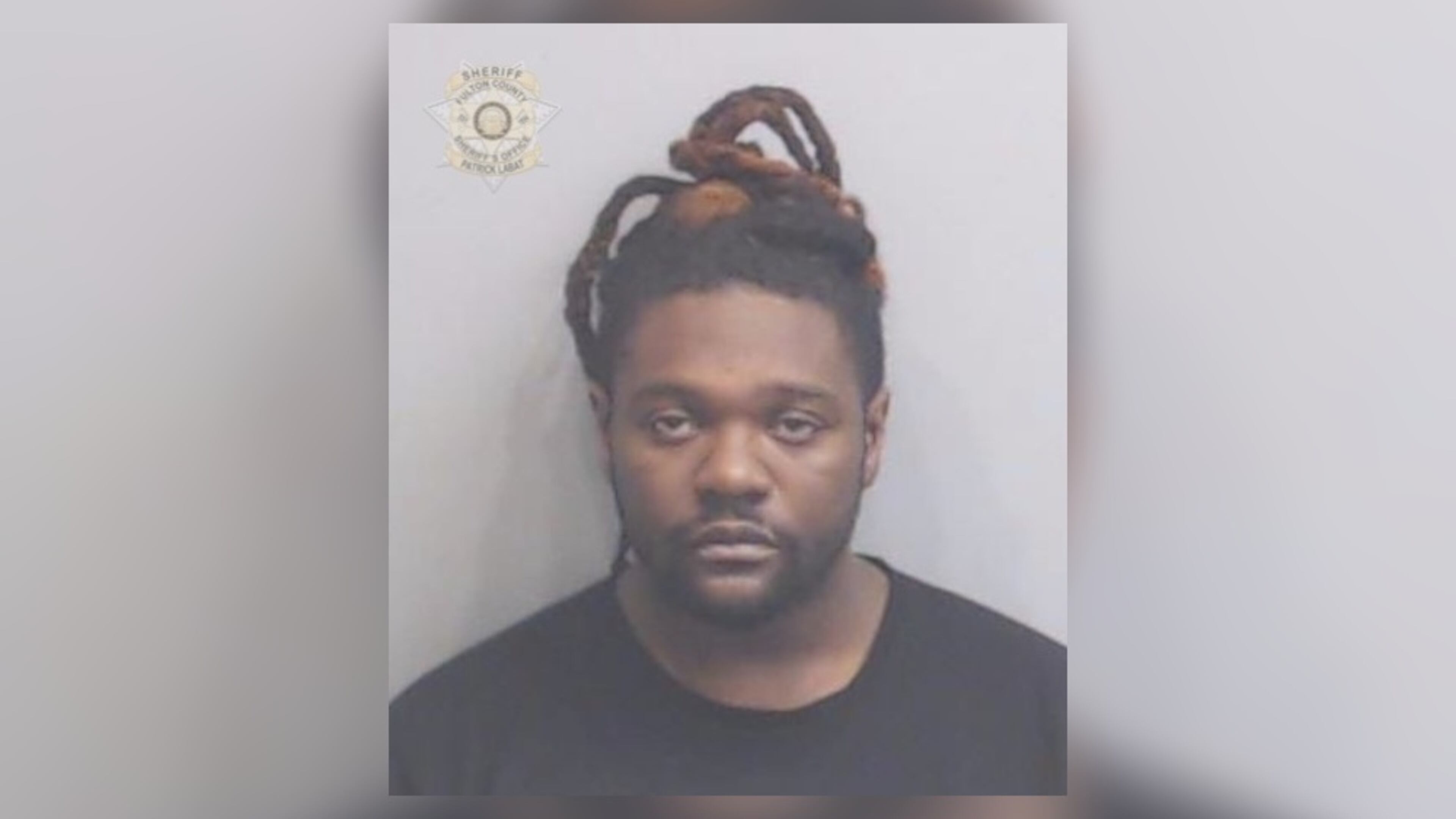 Chad Okelley, 28, was arrested and faces a murder charge in the January shooting death of Anthony Hopgood in East Point. (Credit: Fulton County Sheriff's Office)