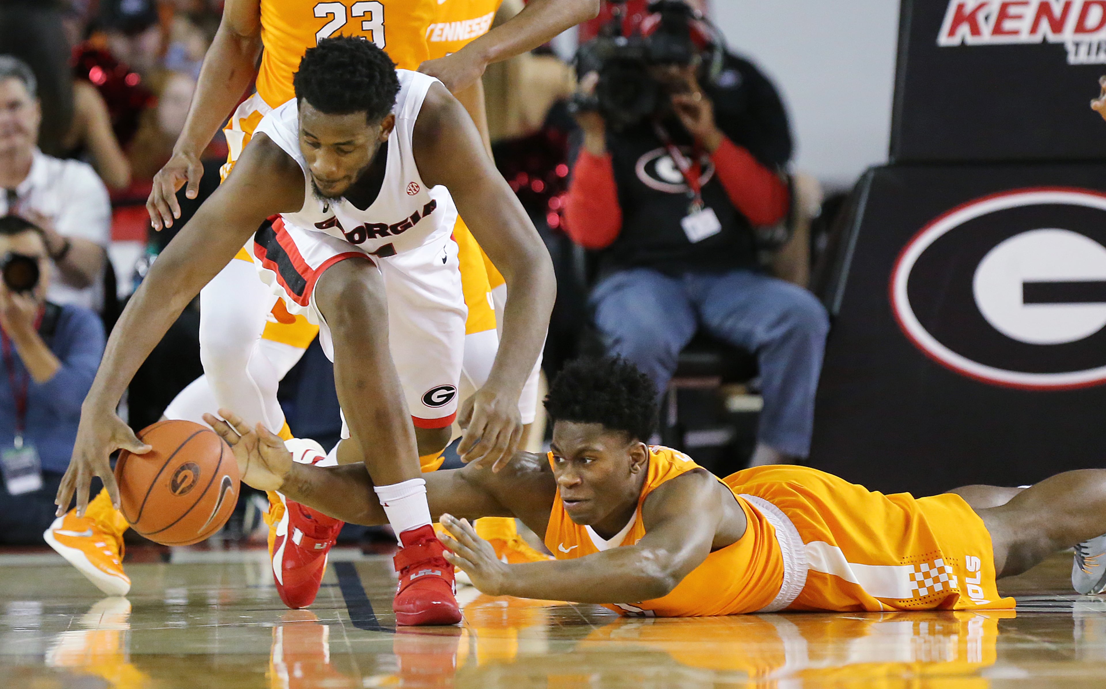 Georgia guard J.J. Frazier drives past Tennessee defender Devon Baulkman for two of his team high 28-points in a basketball game on Wednesday, Jan. 13, 2016, in Athens. Georgia beat Tennessee 81-72. Curtis Compton / ccompton@ajc.com