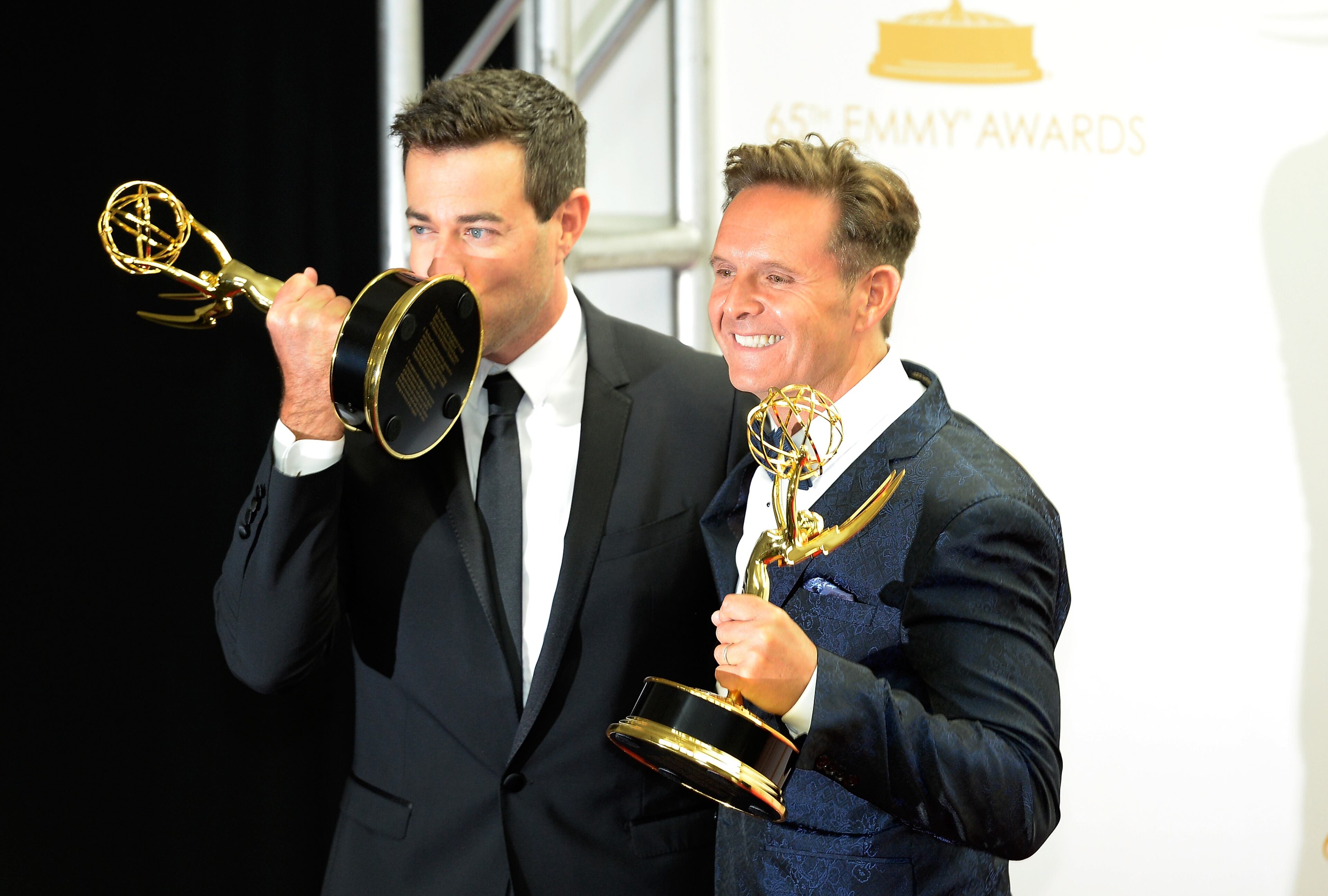 LOS ANGELES, CA - SEPTEMBER 22: Producer Carson Daly (L) and Executive Producer Mark Burnett, winners of the Outstanding Reality - Competition Program Award for 'The Voice' poses in the press room during the 65th Annual Primetime Emmy Awards held at Nokia Theatre L.A. Live on September 22, 2013 in Los Angeles, California. (Photo by Kevork Djansezian/Getty Images)