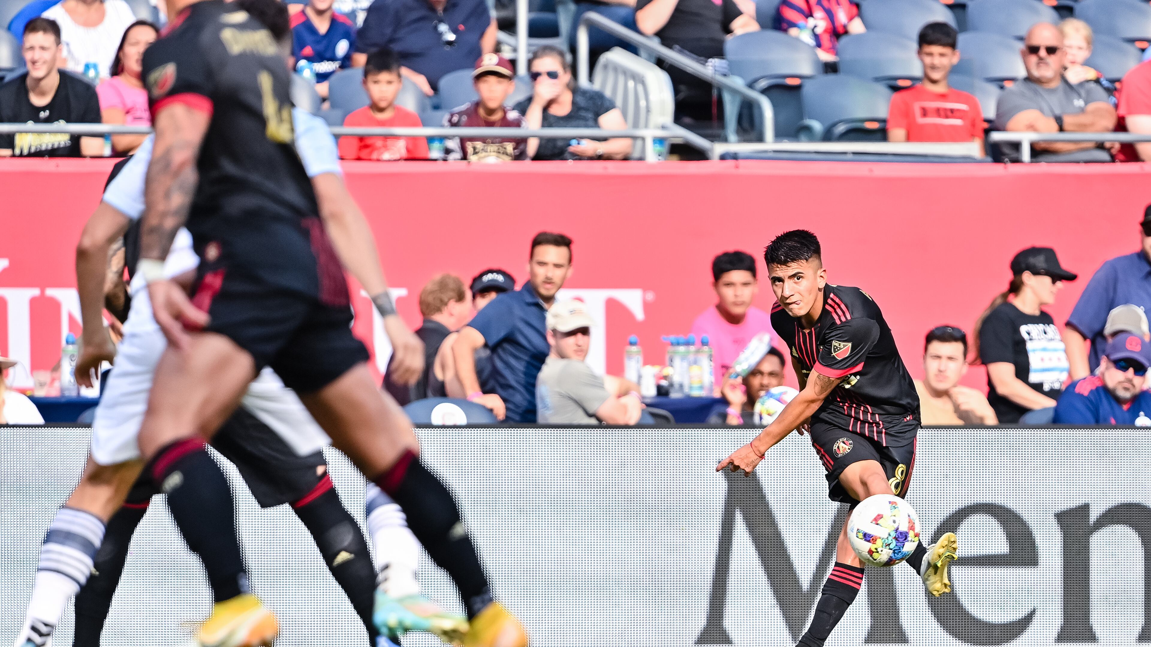 Atlanta United midfielder Thiago Almada #8 kicks the ball during the second half of the match against Chicago Fire FC at Soldier Field in Chicago, United States on Saturday July 30, 2022. (Photo by Dakota Williams/Atlanta United)