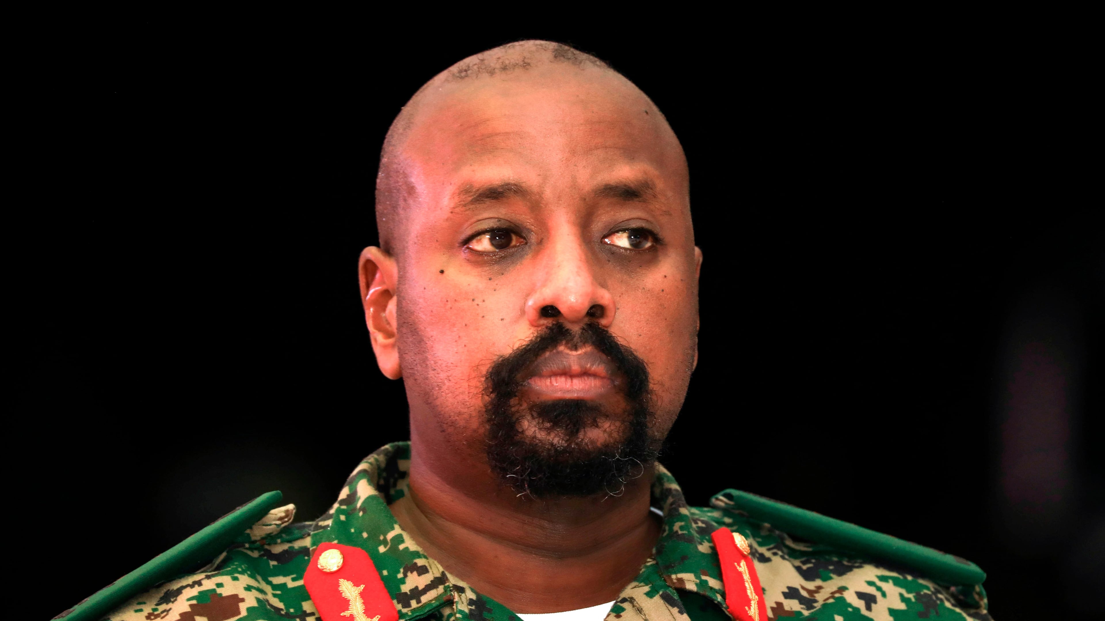 FILE - Lt. Gen. Muhoozi Kainerugaba, son of Uganda's President Yoweri Museveni, attends a "thanksgiving" ceremony in Entebbe, Uganda late Saturday, May 7, 2022. (AP Photo/Hajarah Nalwadda, File)