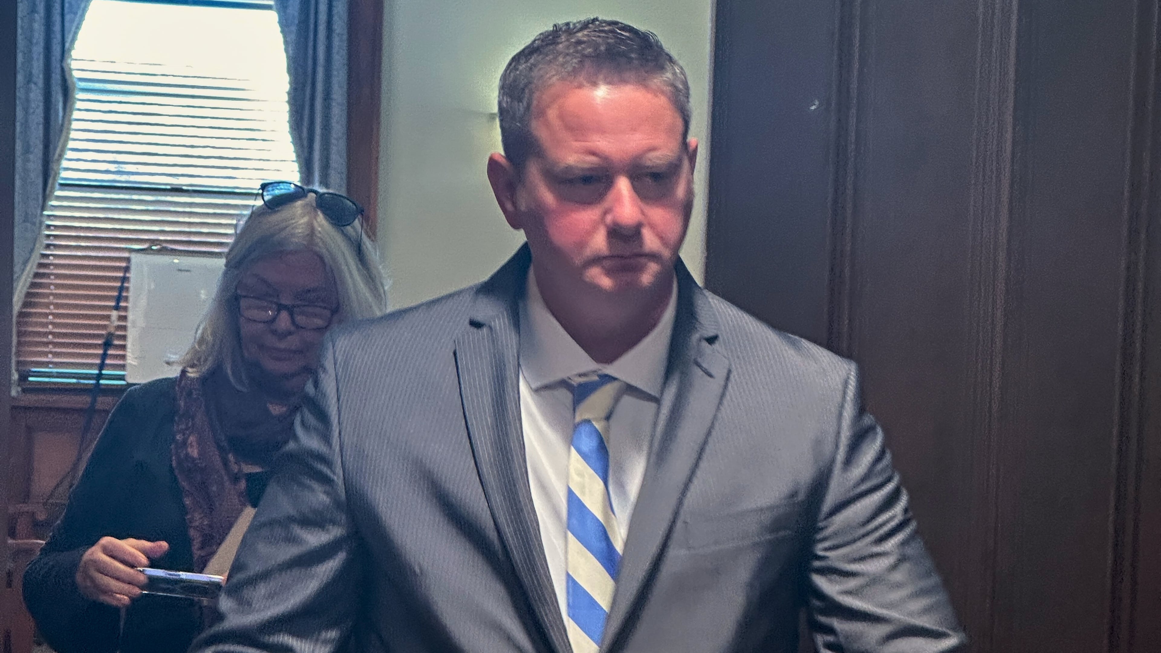 FILEL - Former New York state trooper Christopher Baldner, who is charged in the death of an 11-year-old girl, leaves the court room during his trial Tuesday, Oct. 28, 2025 in Kingston, N.Y. (AP Photo/Michael Hill, File)