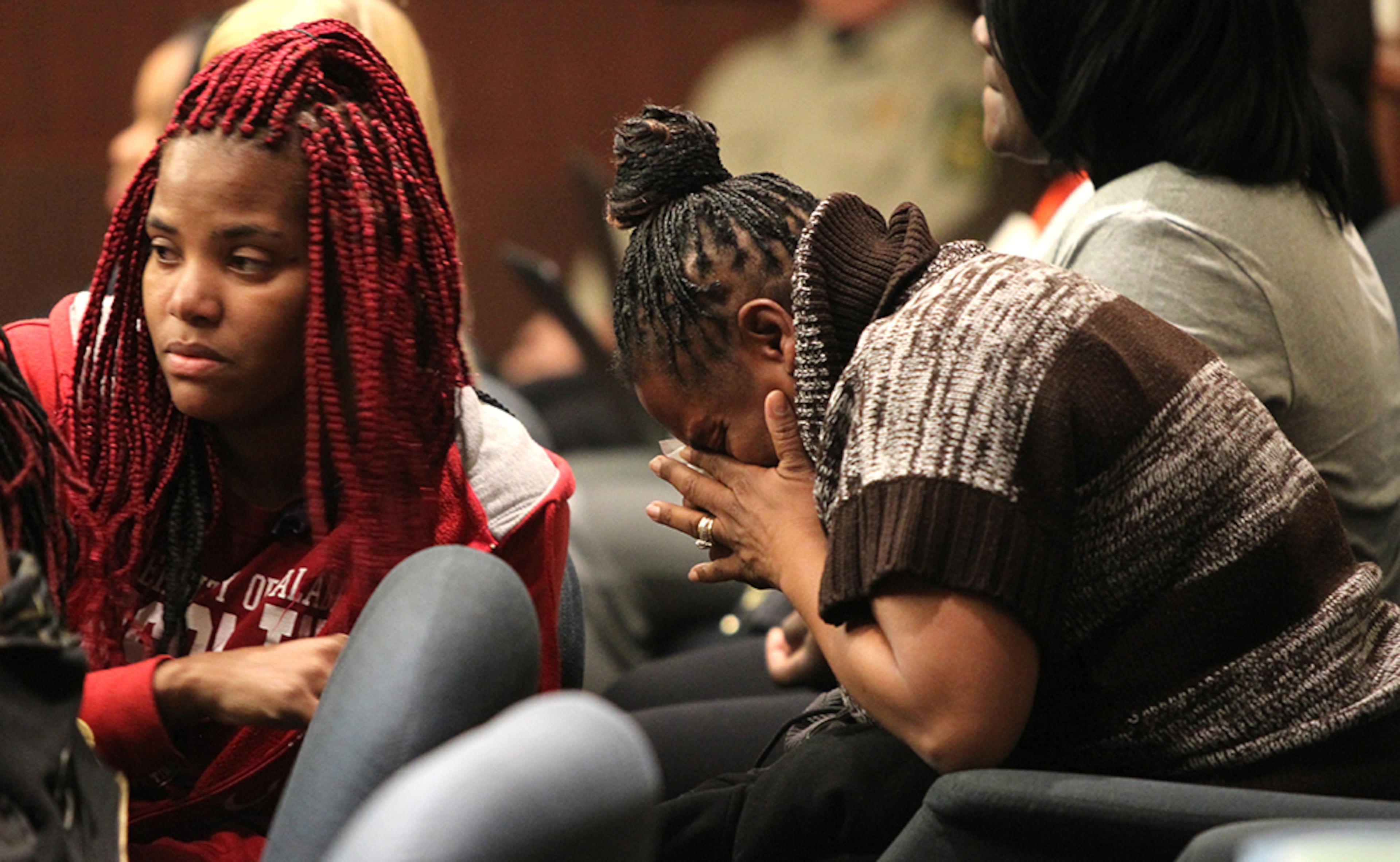 Melissa Alford (right) weeps in the jury stands while those around attempt to comfort her at the Douglas County Courthouse in Douglasville, Georgia, on Monday, February 27, 2017. During the sentencing of Jose Torres and Kayla Norton, Norton stood up to speak on her own behalf and plead to those in the court for mercy; Alfred had kept herself together throughout the entire sentencing but following Nortons speech, broke down and had to leave the room. (HENRY TAYLOR / HENRY.TAYLOR@AJC.COM)