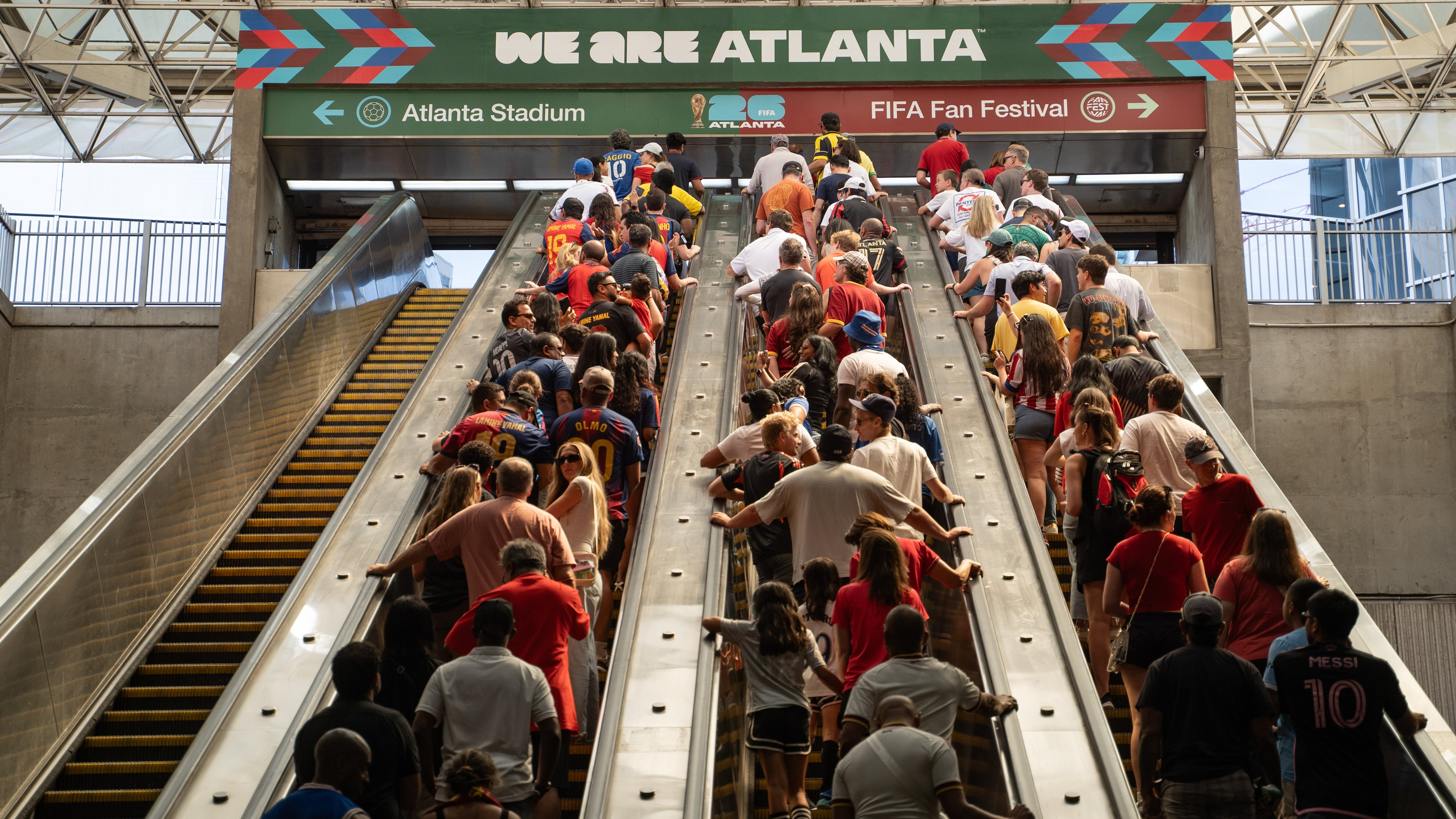 Fans exit the SEC District MARTA station to attend the first FIFA match in Atlanta on Monday, June 15, 2026. (Ben Hendren for the AJC)