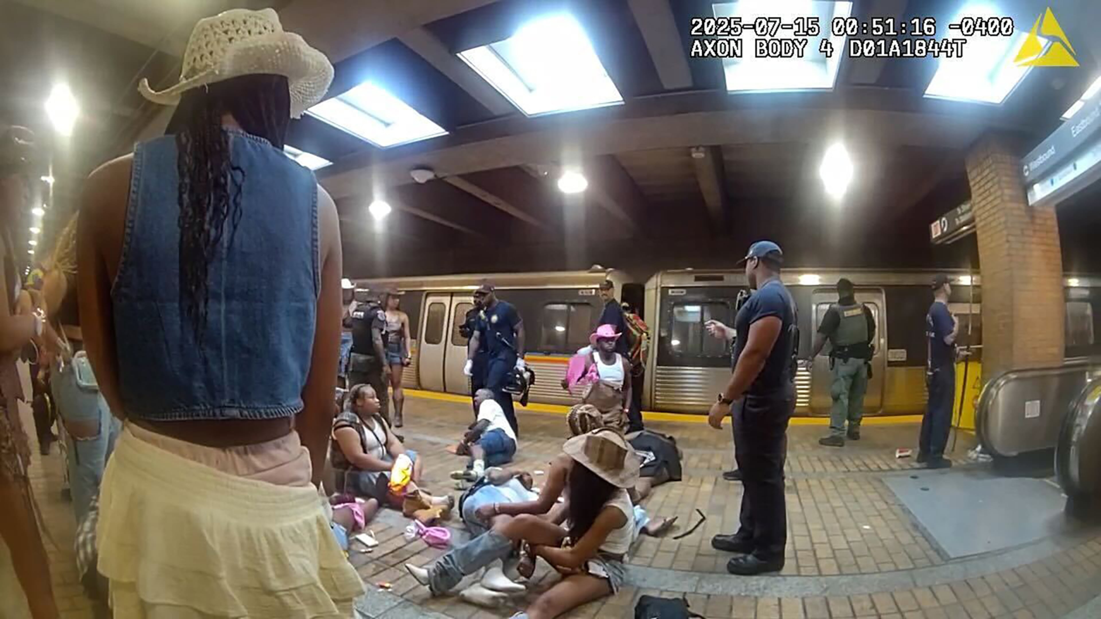 Body cam footage shows people being treated after a MARTA escalator mishap at Vine City Station after a Beyonce concert on July 15, 2025, in Atlanta.