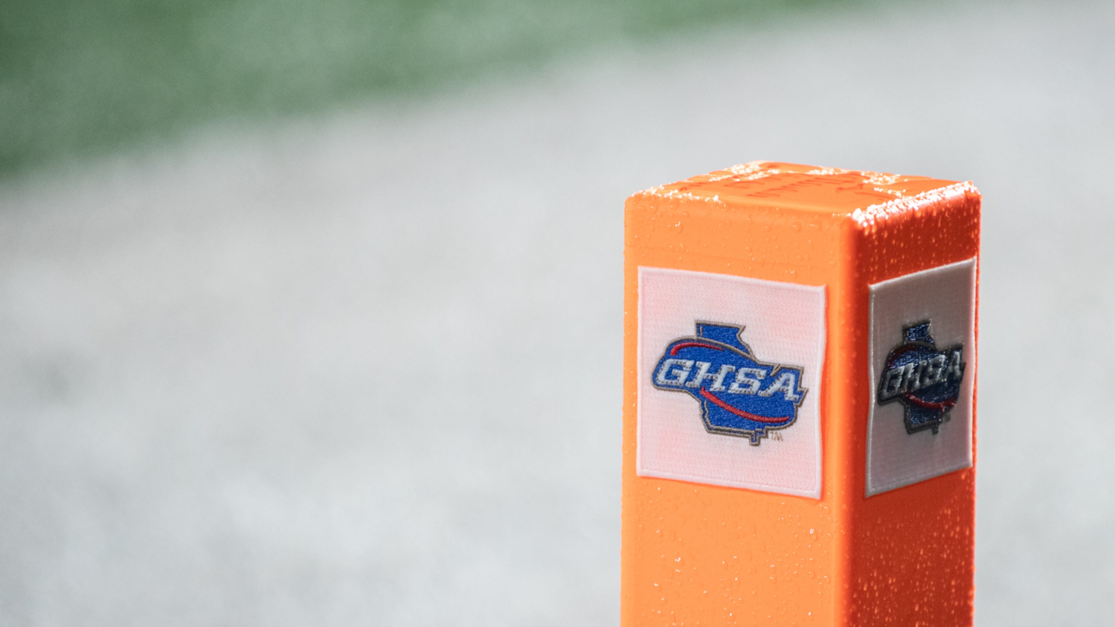 The game starts out rainy at the Hughes vs Gainsville High School football game on Friday, Dec. 9, 2022, at the Georgia State Staduim in Atlanta, Georgia. (Jamie Spaar for the Atlanta Journal Constitution)