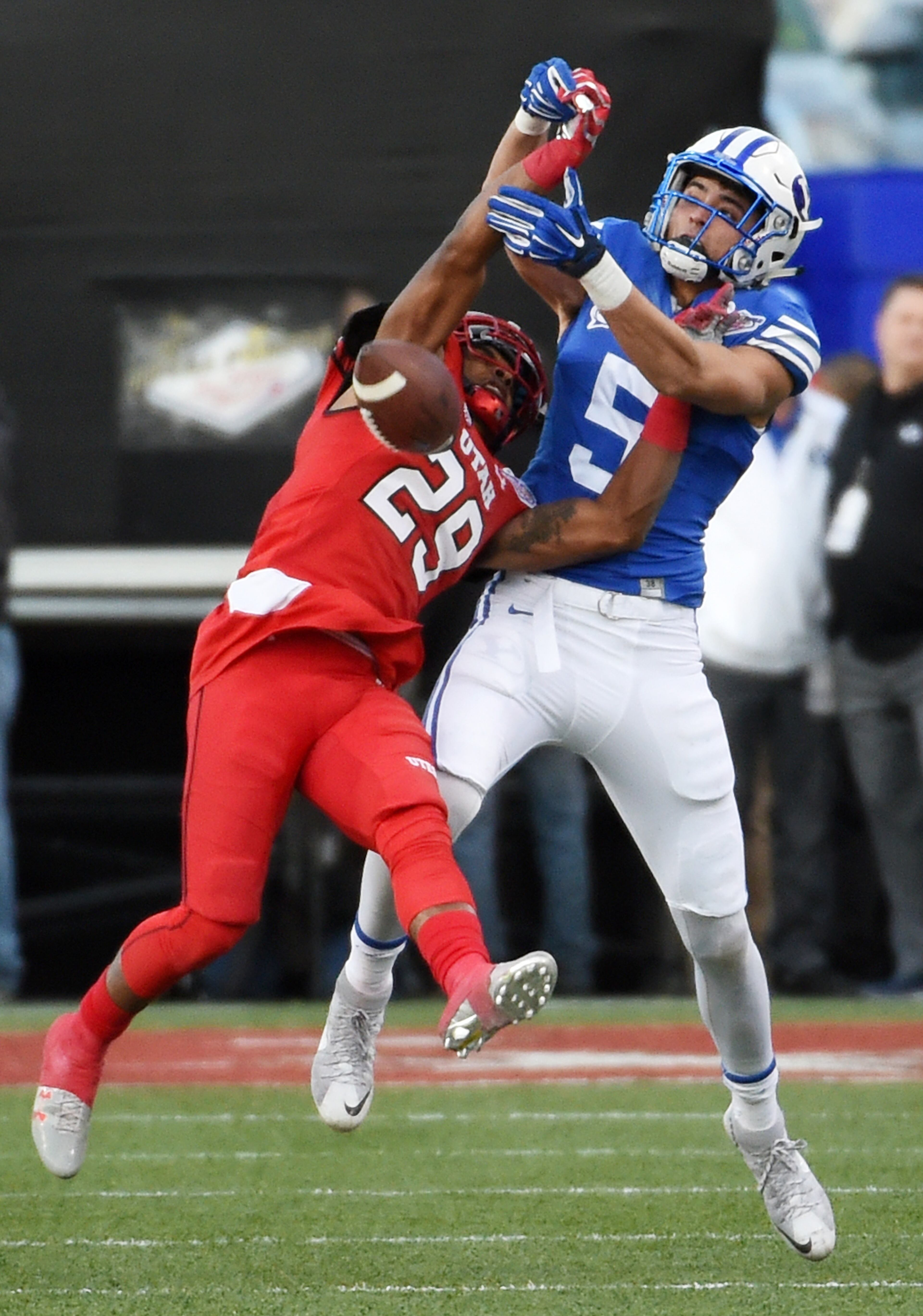 LAS VEGAS, NV - DECEMBER 19: Defensive back Reginald Porter #29 of the Utah Utes breaks up a pass to Nick Kurtz #5 of the Brigham Young Cougars during the Royal Purple Las Vegas Bowl at Sam Boyd Stadium on December 19, 2015 in Las Vegas, Nevada. Utah won 35-28. (Photo by Ethan Miller/Getty Images)