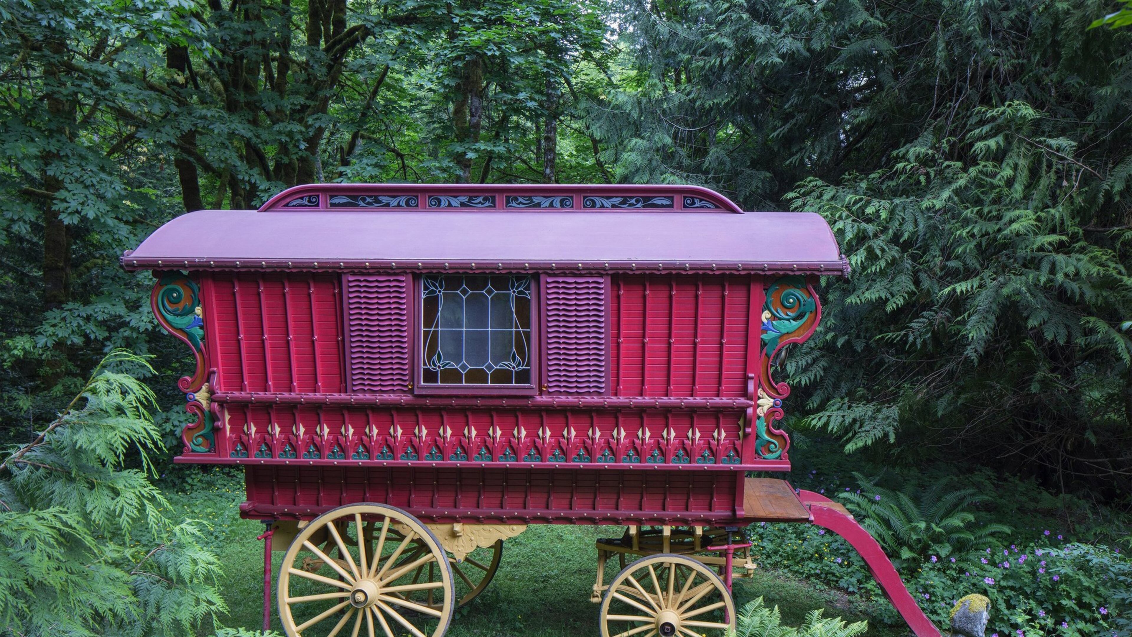 A yellow undercarriage with spoked wheels supports this 13-foot-long Ledge wagon, which Denise Harris built by hand using drawings from the book Making Model Gypsy Caravans. (Steve Ringman/Seattle Times/TNS)