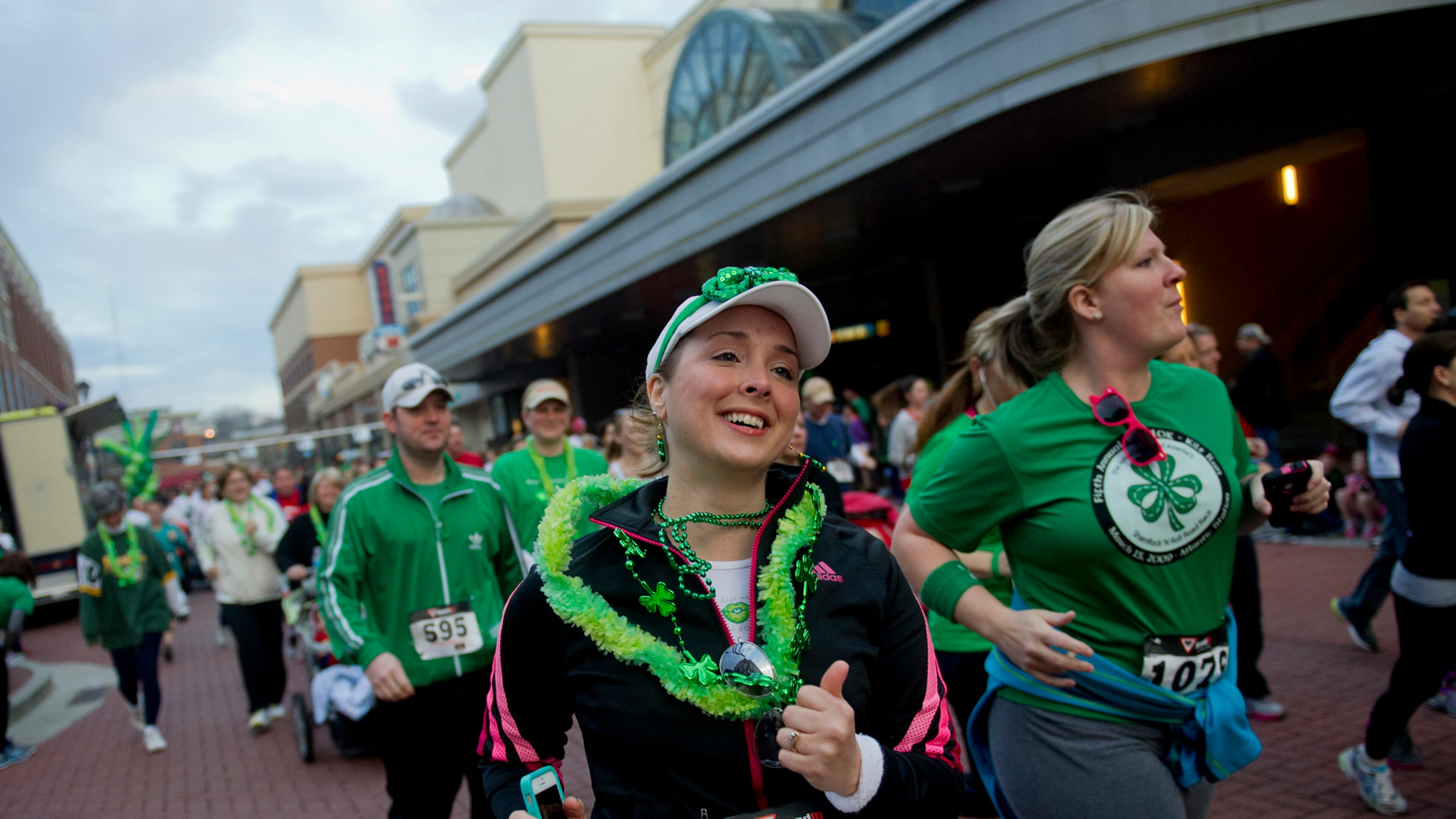 Andrea Huot (594) runs in the 5k during the Junior League of Atlanta's 9th annual ShamRock 'N Roll Road Race Sunday, March 10, 2013.