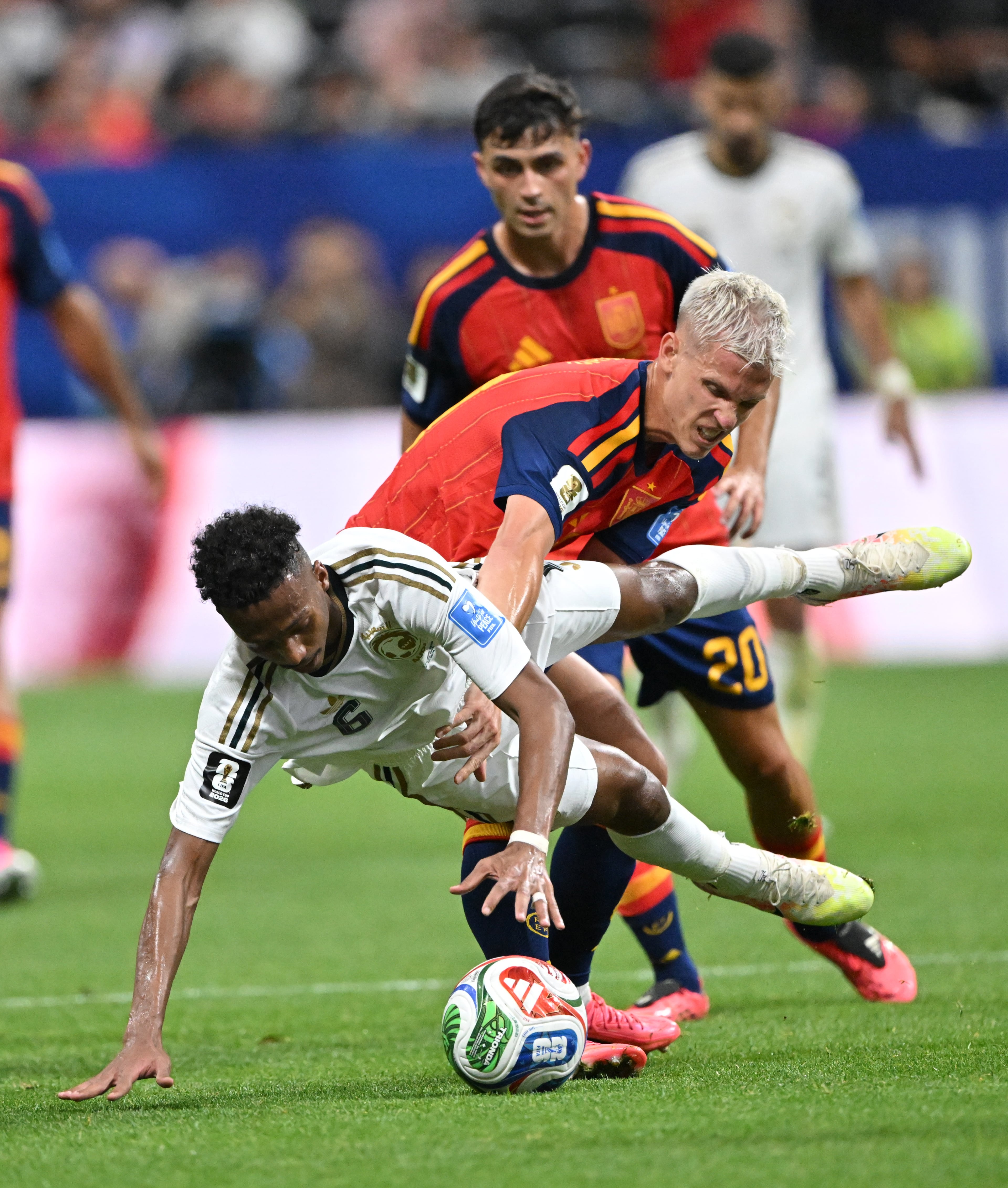 Saudi Arabia's Nasser Al-Dawsari (left) battles Spain's Dani Olmo during the first half of the Spain vs. Saudi Arabia World Cup match Sunday, June 21, 2026, at Atlanta Stadium. (Hyosub Shin/AJC)