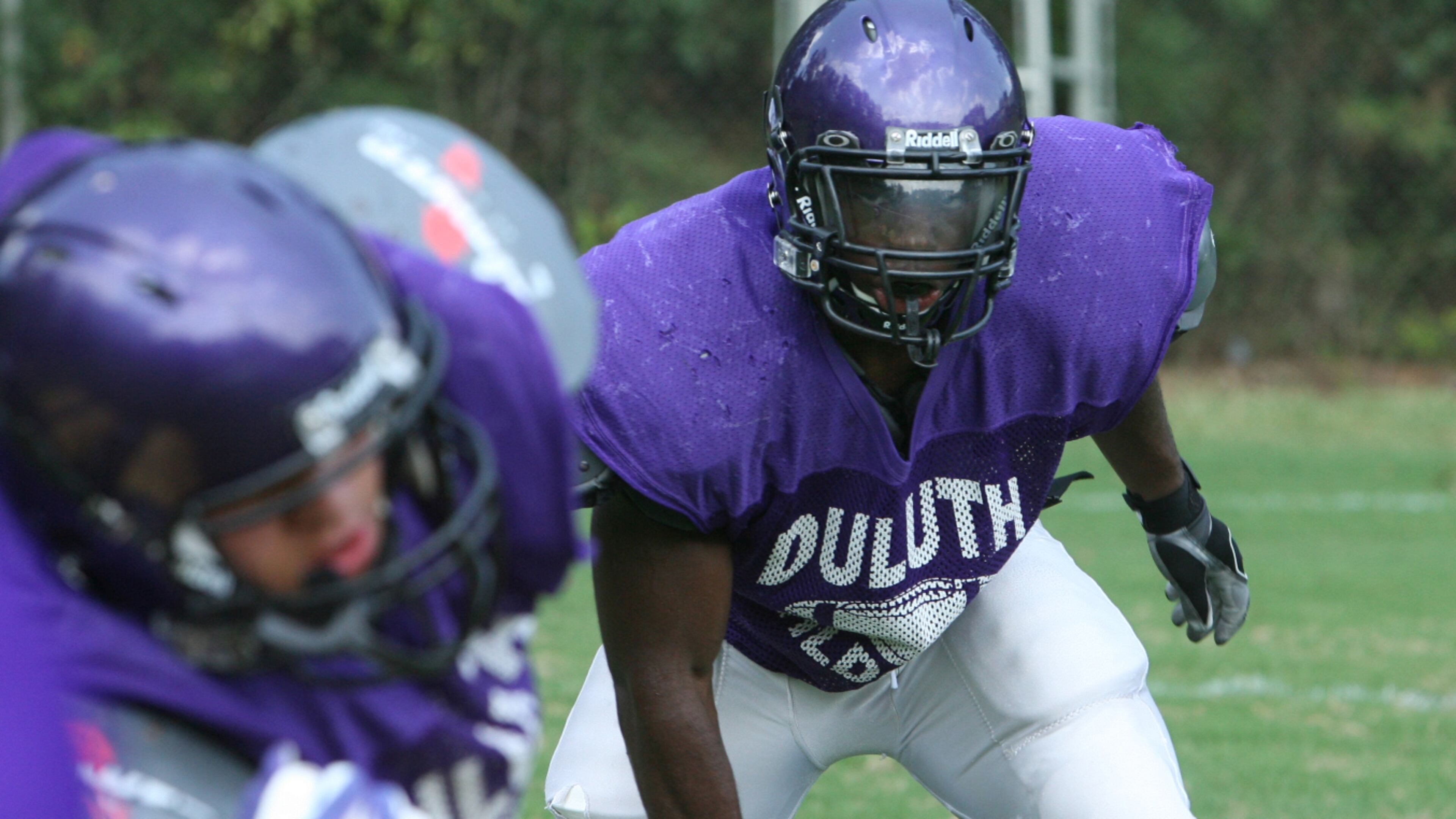 In this file photo, the Duluth Wildcats practice prior to a game. A football booster is charged with taking over $18,000 from the Duluth High School Touchdown Club.