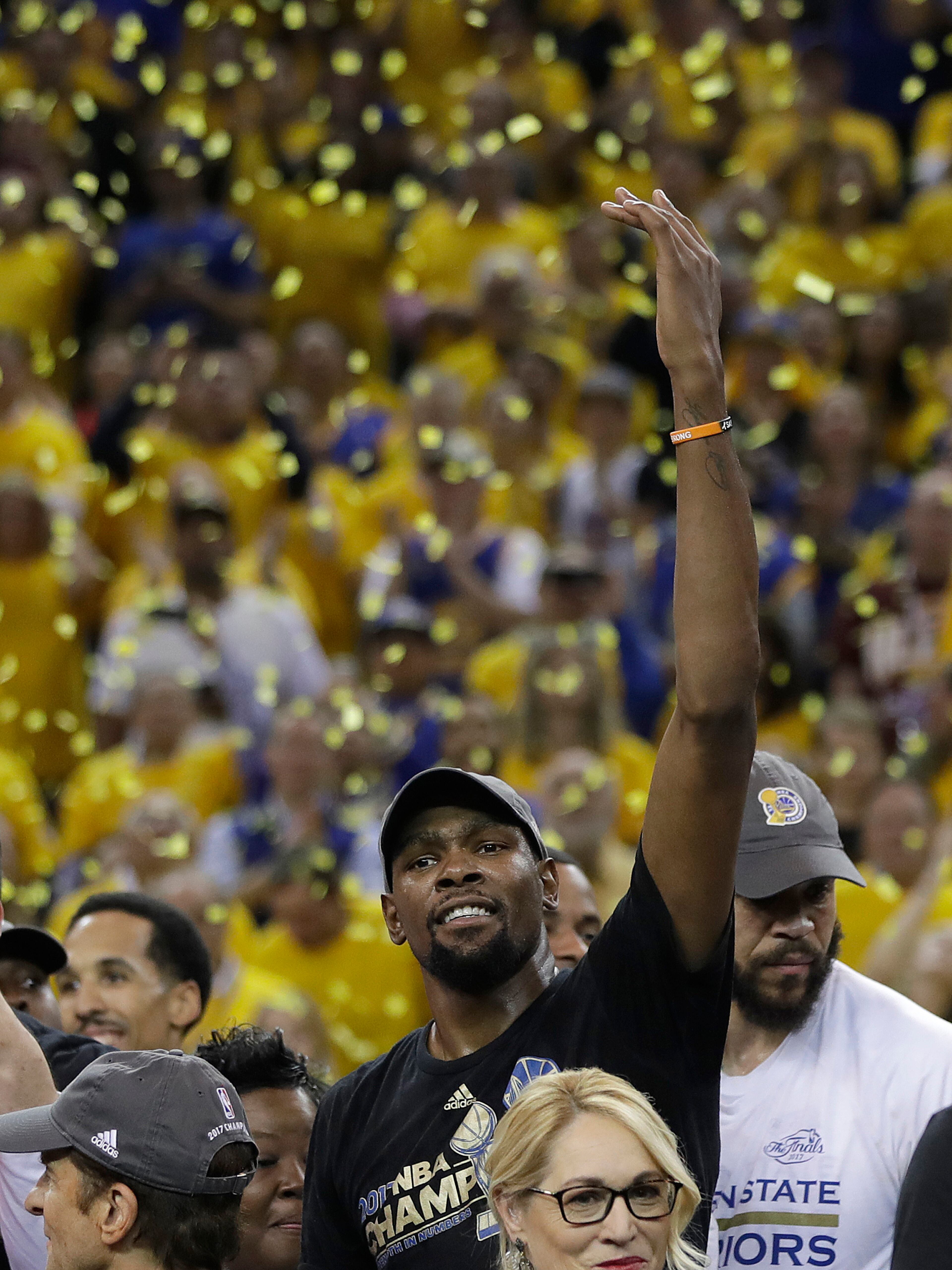 Golden State Warriors forward Kevin Durant celebrates after Game 5 of basketball's NBA Finals between the Warriors and the Cleveland Cavaliers in Oakland, Calif., Monday, June 12, 2017. The Warriors won 129-120 to win the NBA championship. (AP Photo/Marcio Jose Sanchez)