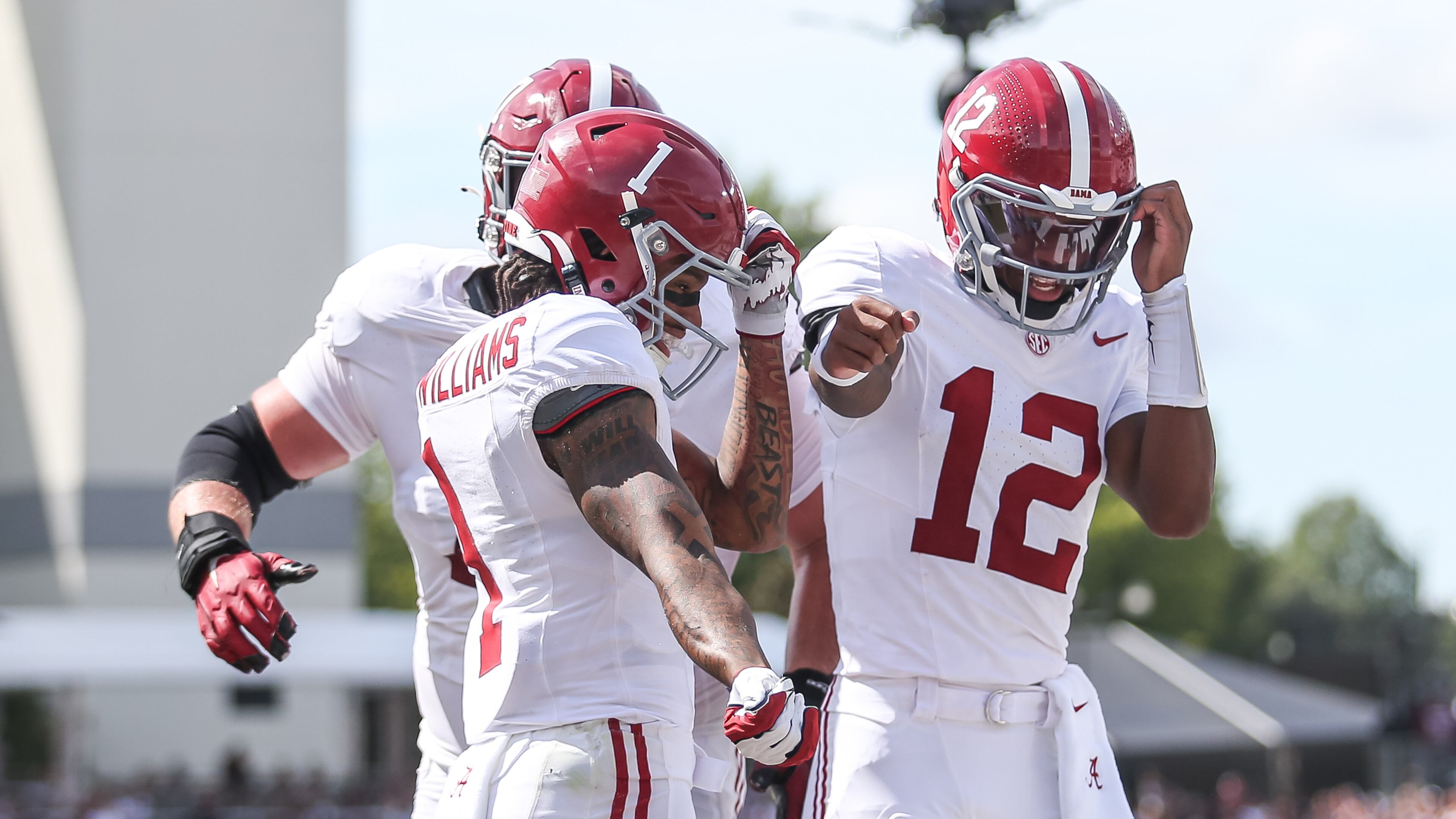 Alabama wide receiver Ryan Coleman-Williams (1) reacts to his touchdown with Alabama quarterback Keelon Russell (12) against Mississippi State during the first half of an NCAA college football game in Starkville, Miss., Saturday, Oct. 3, 2026. (AP Photo/James Pugh)