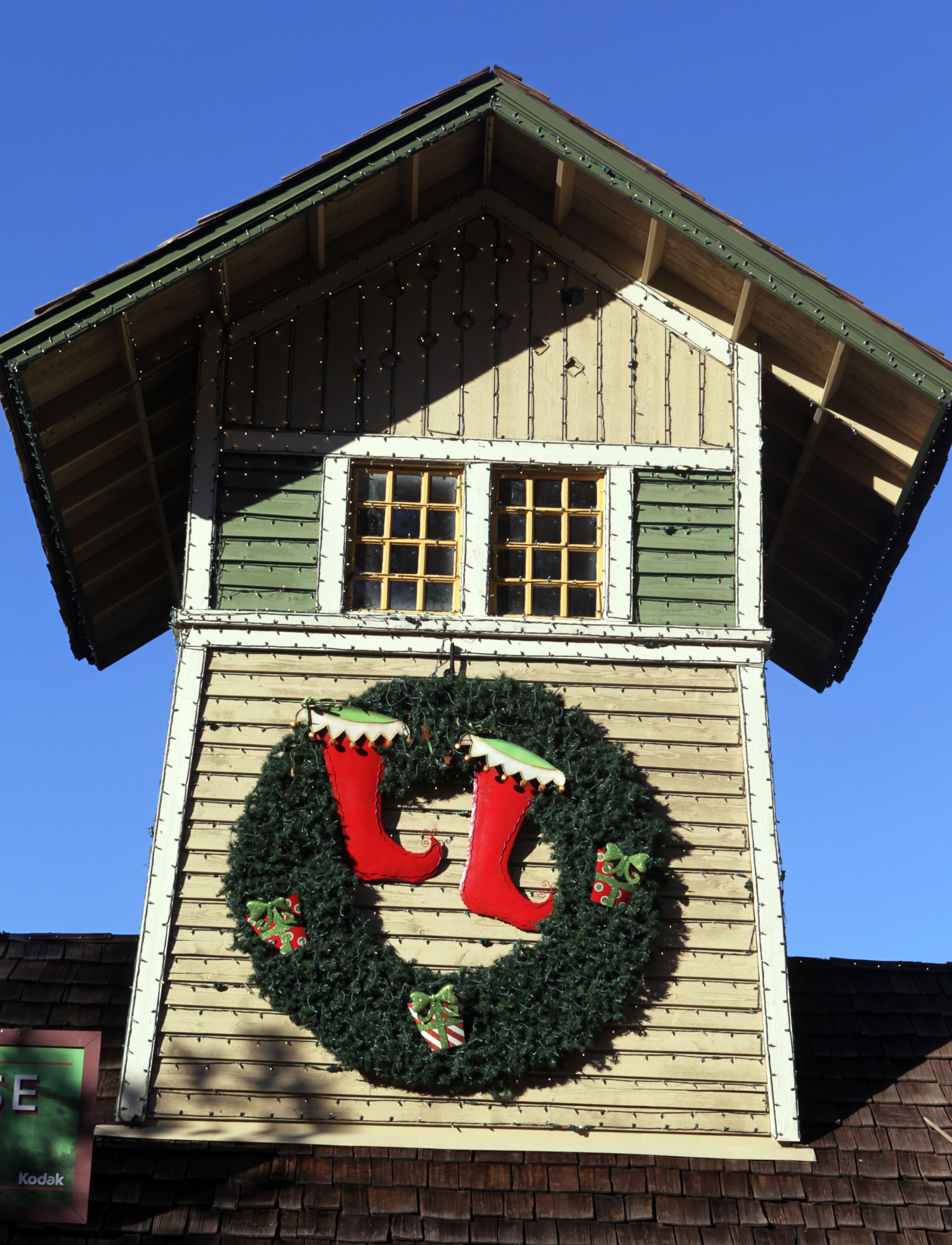 Buildings in the Crossroads attraction at Stone Mountain Park are bedecked in Christmas lights and decorations.