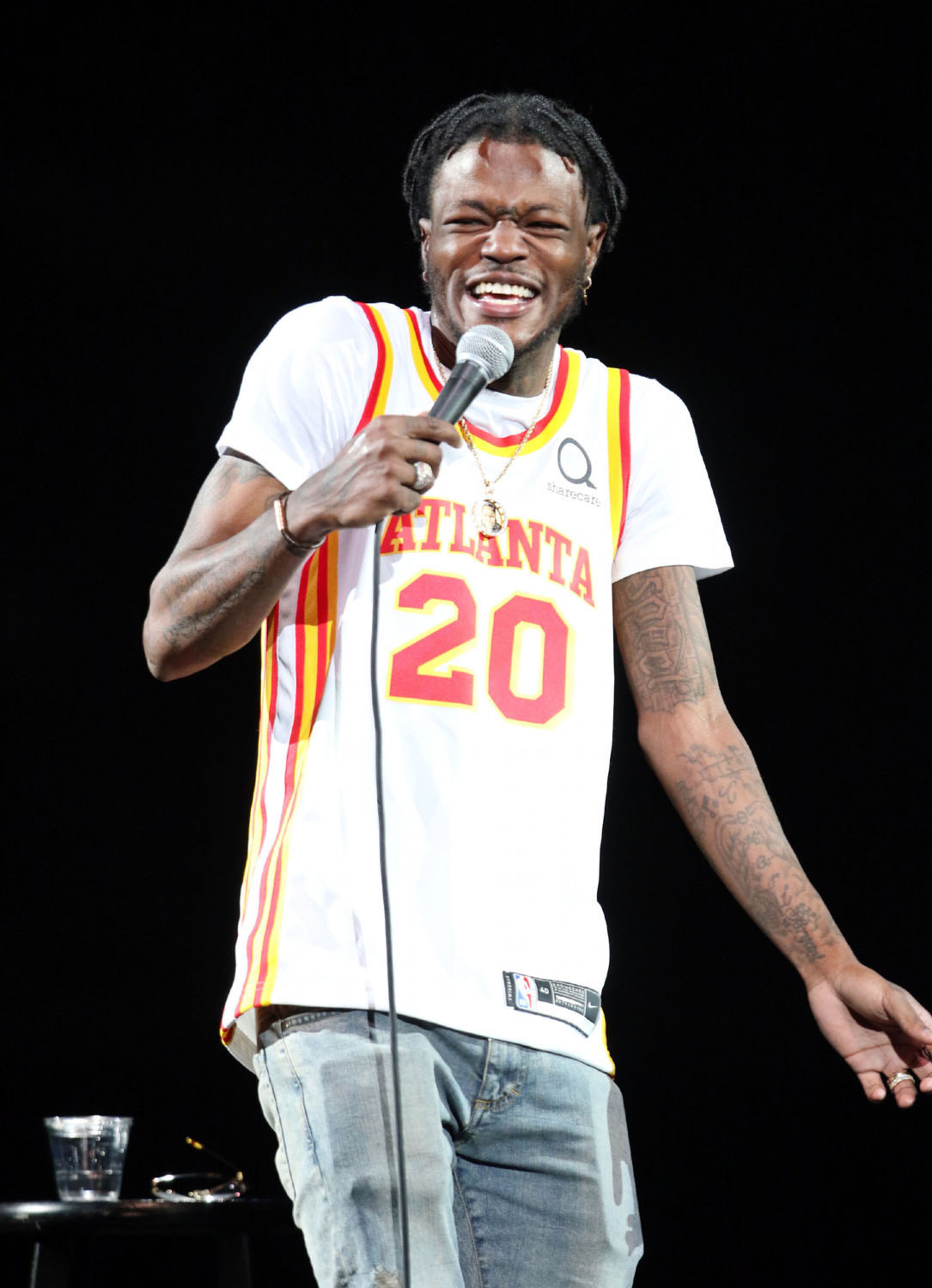 DC Young Fly performs at The "In Real Life Comedy Tour", the first of four sold-out shows (two nights), in a socially distanced and limited seating setup at State Farm Arena on Friday night, May 7, 2021. The show also featured Mike Epps, Karlous Miller, Kountry Wayne, Lavell Crawford and Henry Welch. (Photo: Robb Cohen for The Atlanta Journal-Constitution)