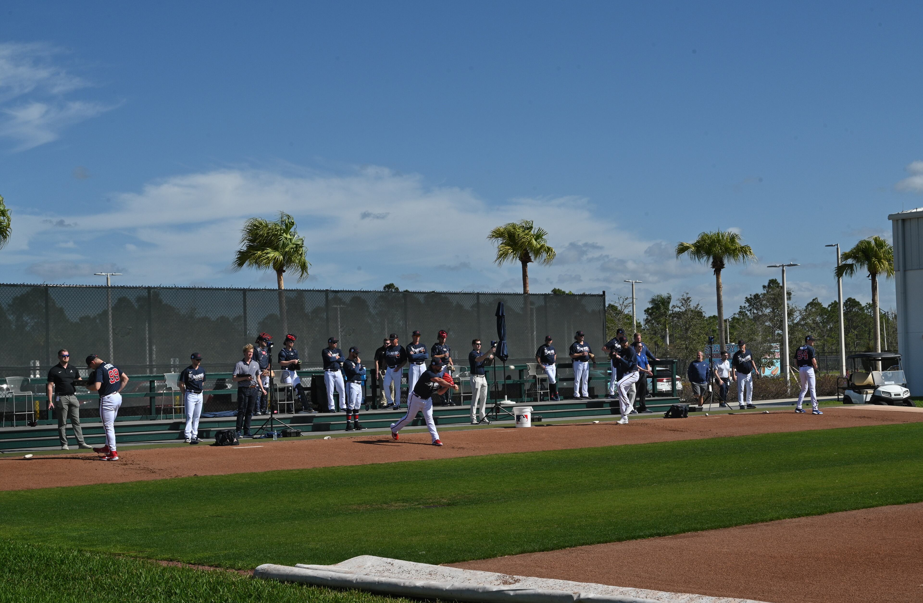 Braves pitchers (from left) Spencer Strider, Kirby Yates, Ian Anderson and Max Fried work out during spring training Thursday at CoolToday Park in North Port, Florida. (Hyosub Shin / Hyosub.Shin@ajc.com)