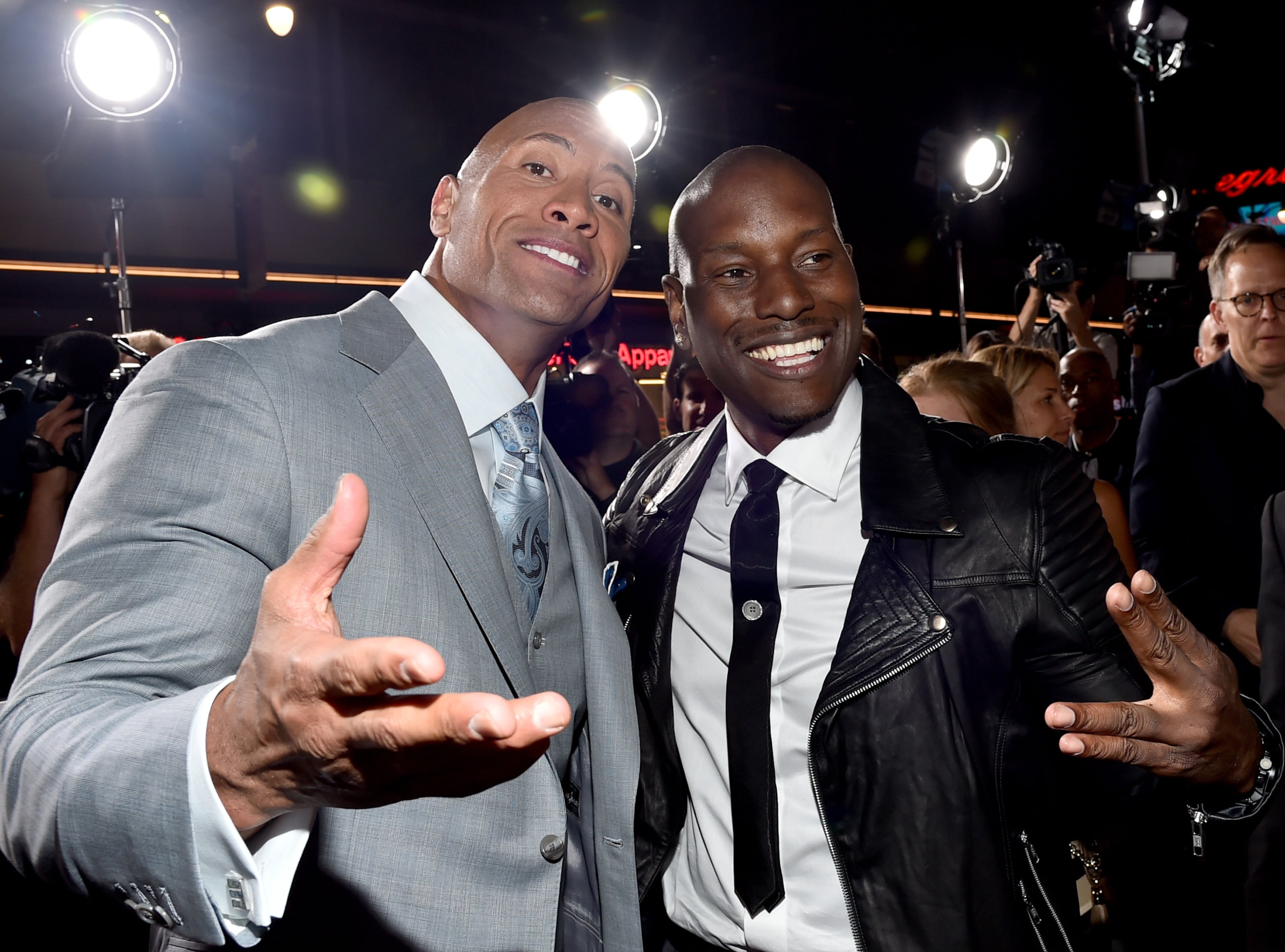 HOLLYWOOD, CA - APRIL 01: Actor Dwayne 'The Rock' Johnson (L) and recording artist/actor Tyrese Gibson attend Universal Pictures' "Furious 7" premiere at TCL Chinese Theatre on April 1, 2015 in Hollywood, California. (Photo by Alberto E. Rodriguez/Getty Images)
