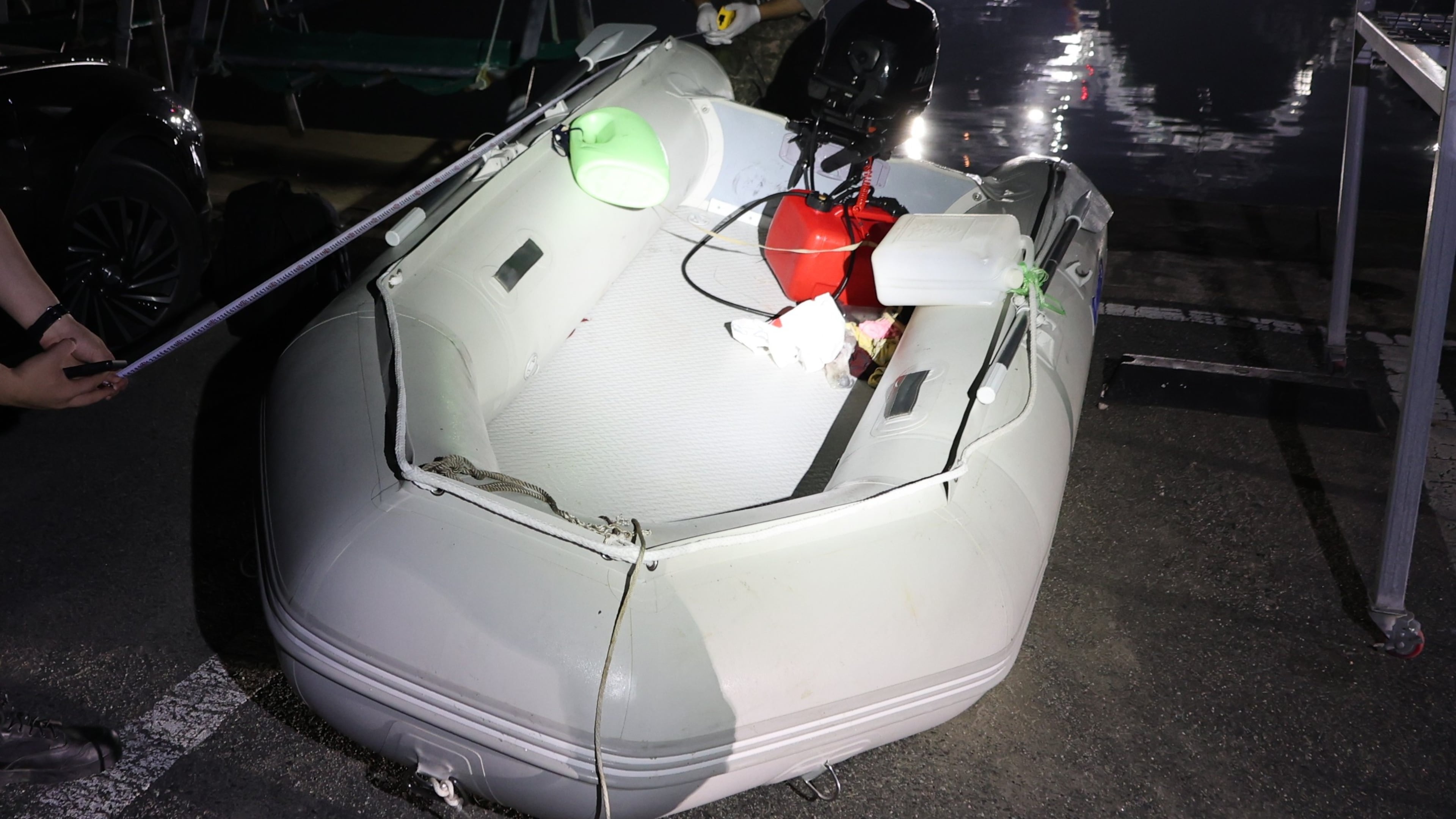 This photo provided by The Taean Maritime Police, shows the rubber boat that a Chinese national had boarded when he was detained in the waters off South Korea's west coast, at a port in Taean, South Korea, Tuesday, May 26, 2026. (The Taean Maritime Police/ via AP)