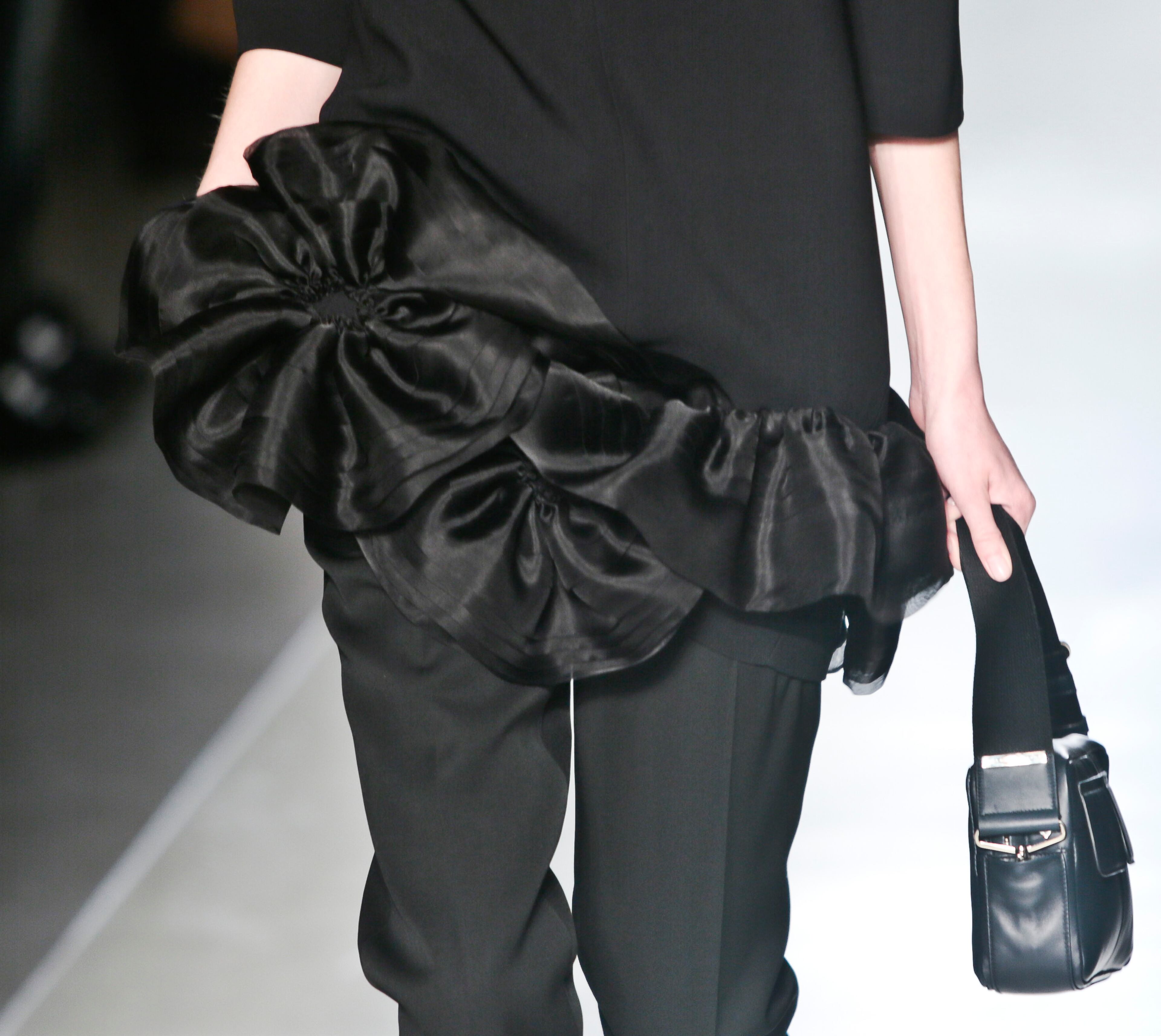 Fashion from the Victoria Beckham Fall 2014 collection is modeled, during New York Fashion Week on Sunday Feb. 9, 2014. (AP Photo/Bebeto Matthews)