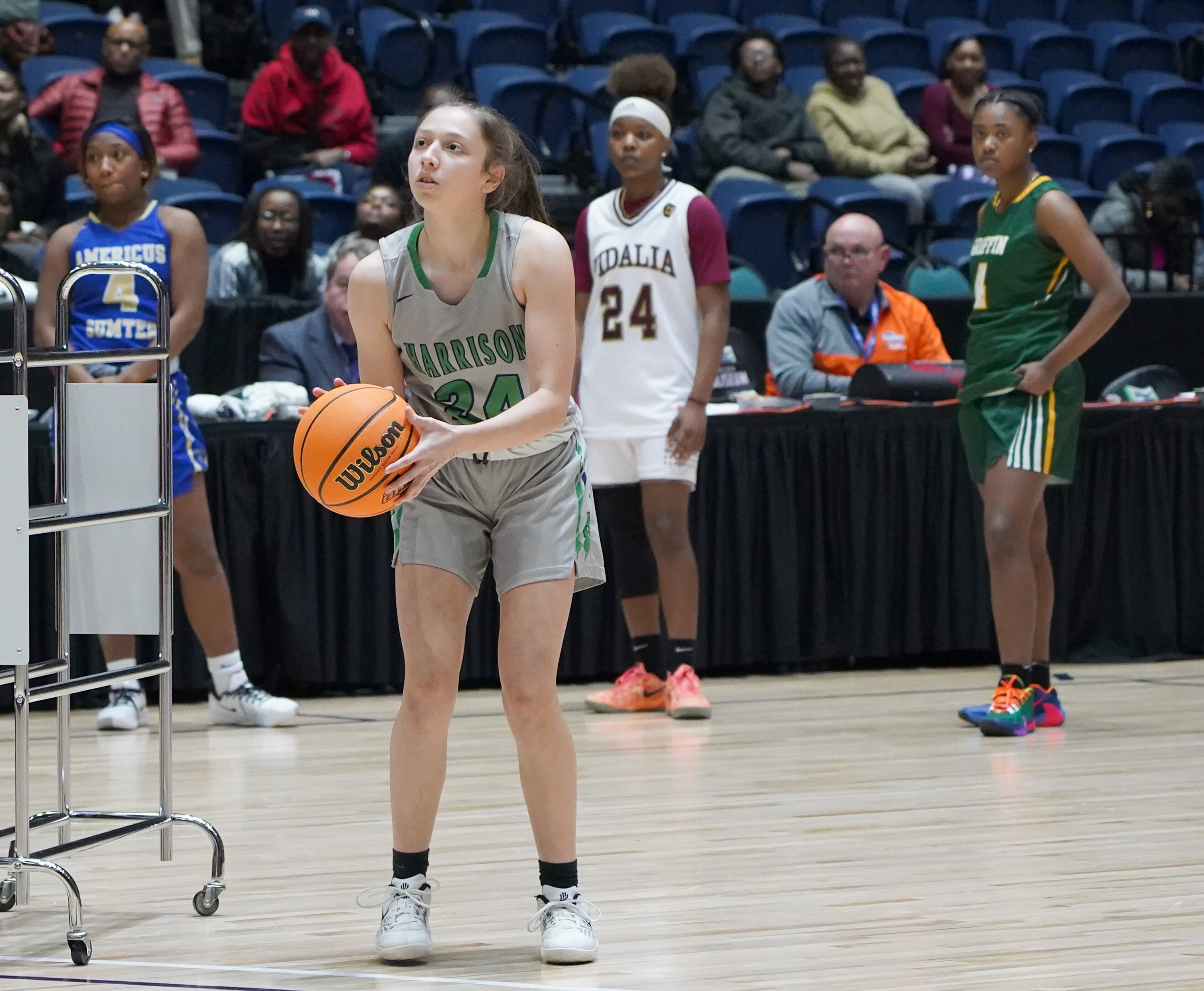 Harrison's Emily Acampora shoots during the three-point contest, which she won. Tami Chappell for the Atlanta Journal Constitution