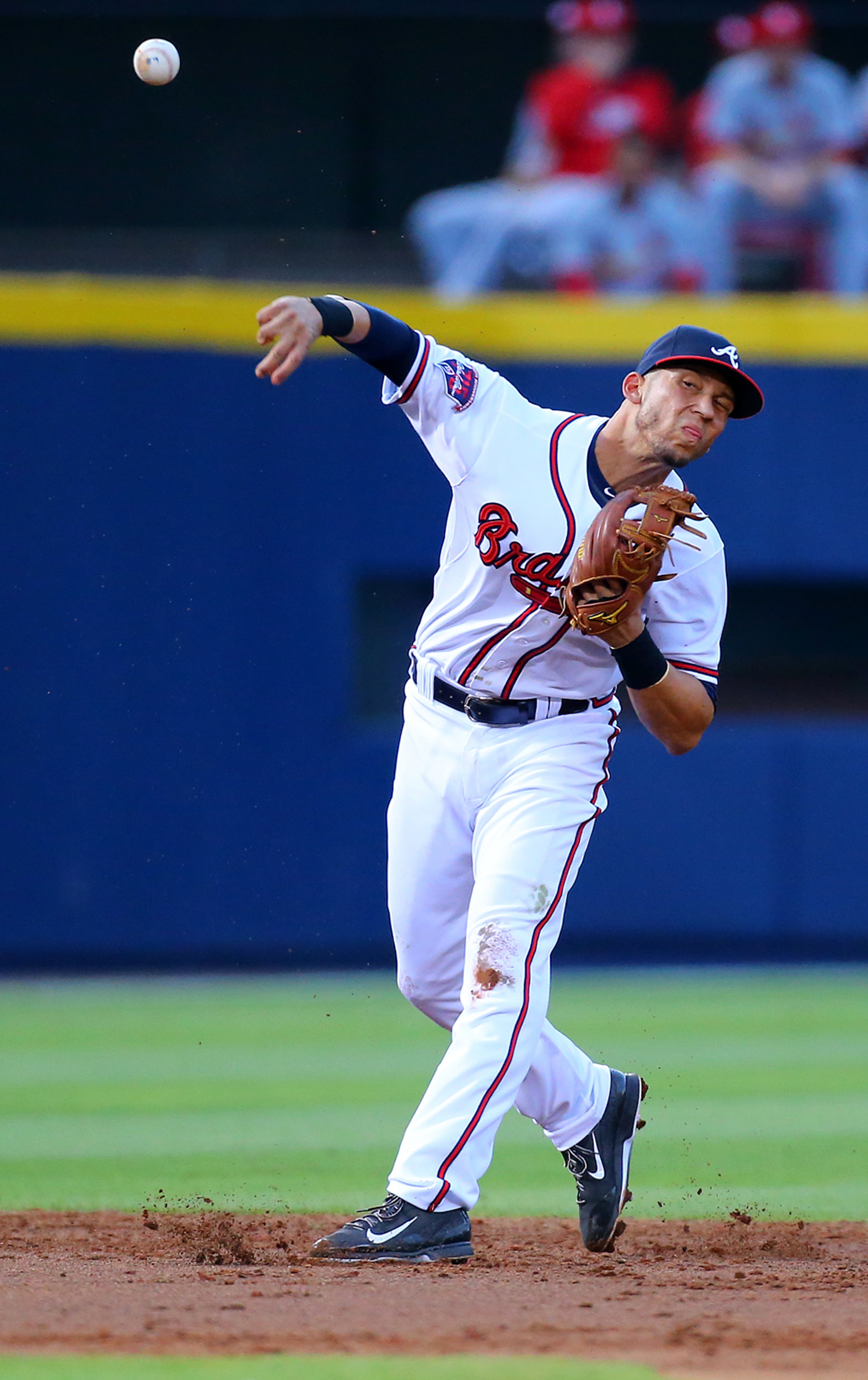 Braves shortstop Andrelton Simmons knocks down a hard hit ball by Cardinals Yadier Molina and throws to first during their MLB game on Monday, May 5, 2014, in Atlanta. CURTIS COMPTON / CCOMPTON@AJC.COM