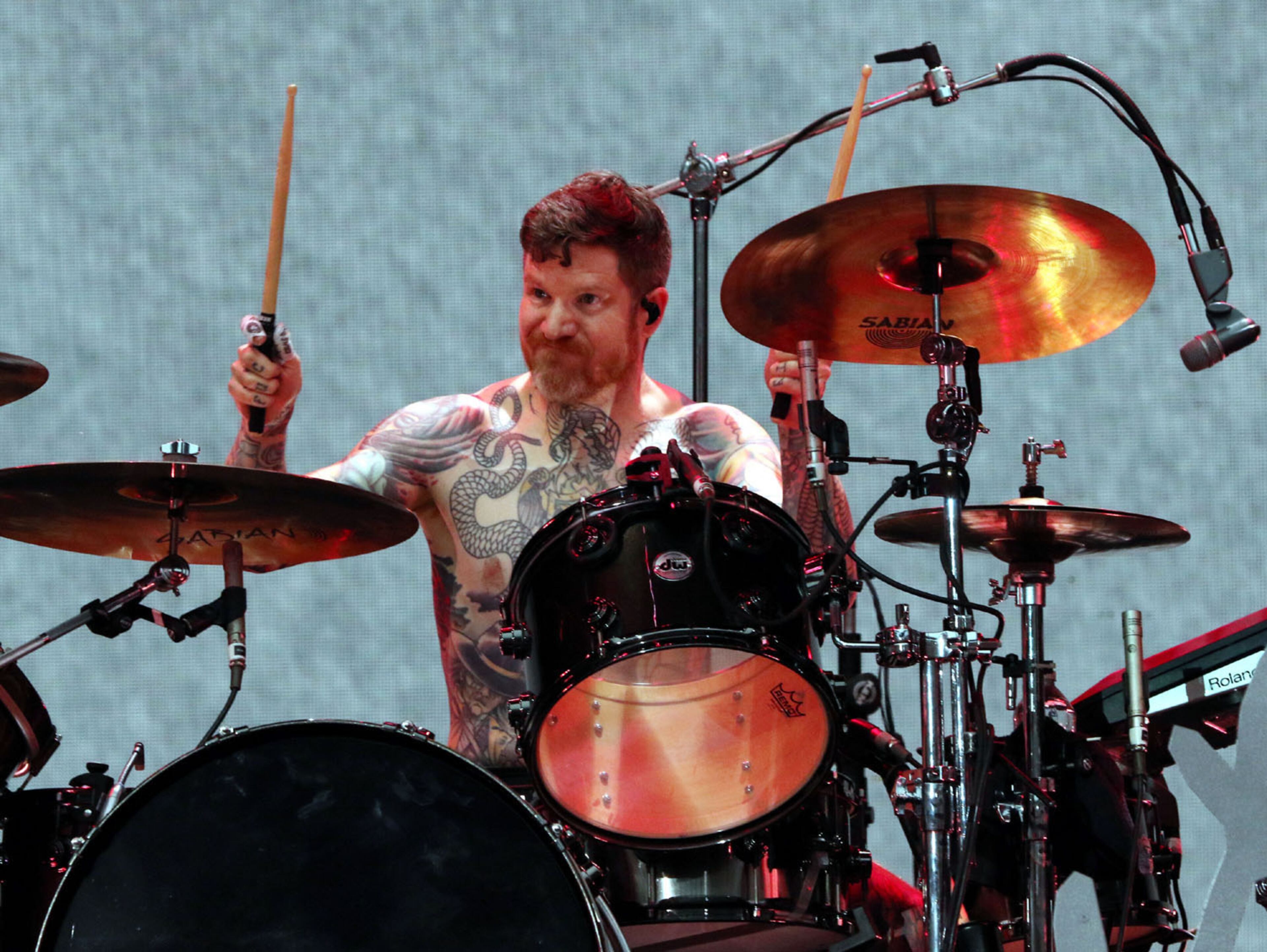-- FOB drummer Andy Hurley
Green Day, Fall Out Boy and Weezer rocked out Truist Park on Tuesday, July 27, 2021 on the Hella Mega Tour.
An estimated 40,000 concert fans celebrated the return of live music and even early rains could not dampen the festive atmosphere at the Braves stadium.
Robb Cohen for the Atlanta Journal-Constitution