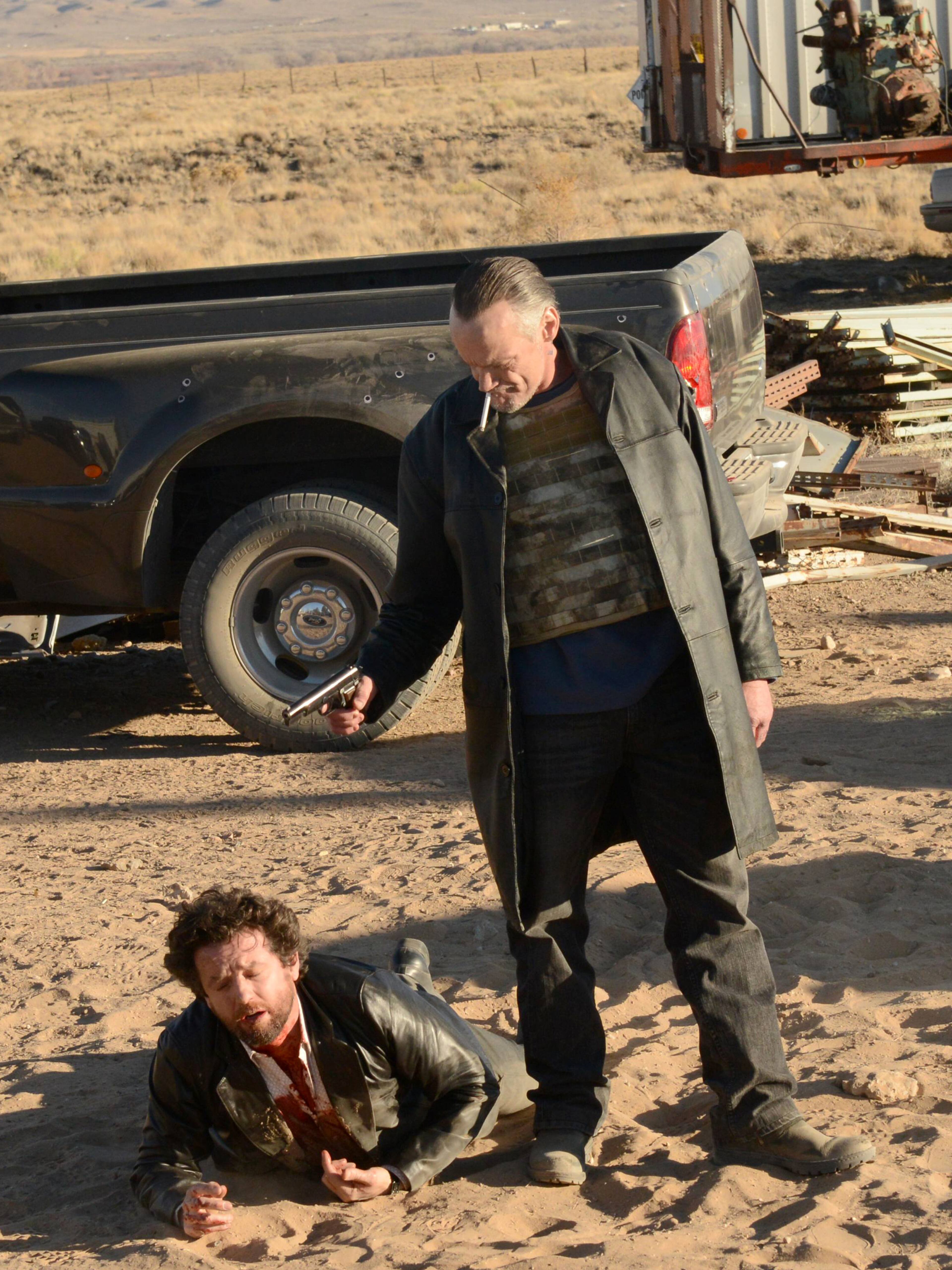 This image released by AMC shows Declan played by Louis Ferreira, left, about to be shot by Uncle Jack, played by Michael Bowen, in a scene from the fifth season of "Breaking Bad." The series finale of the popular drama series airs on Sunday, Sept. 29.