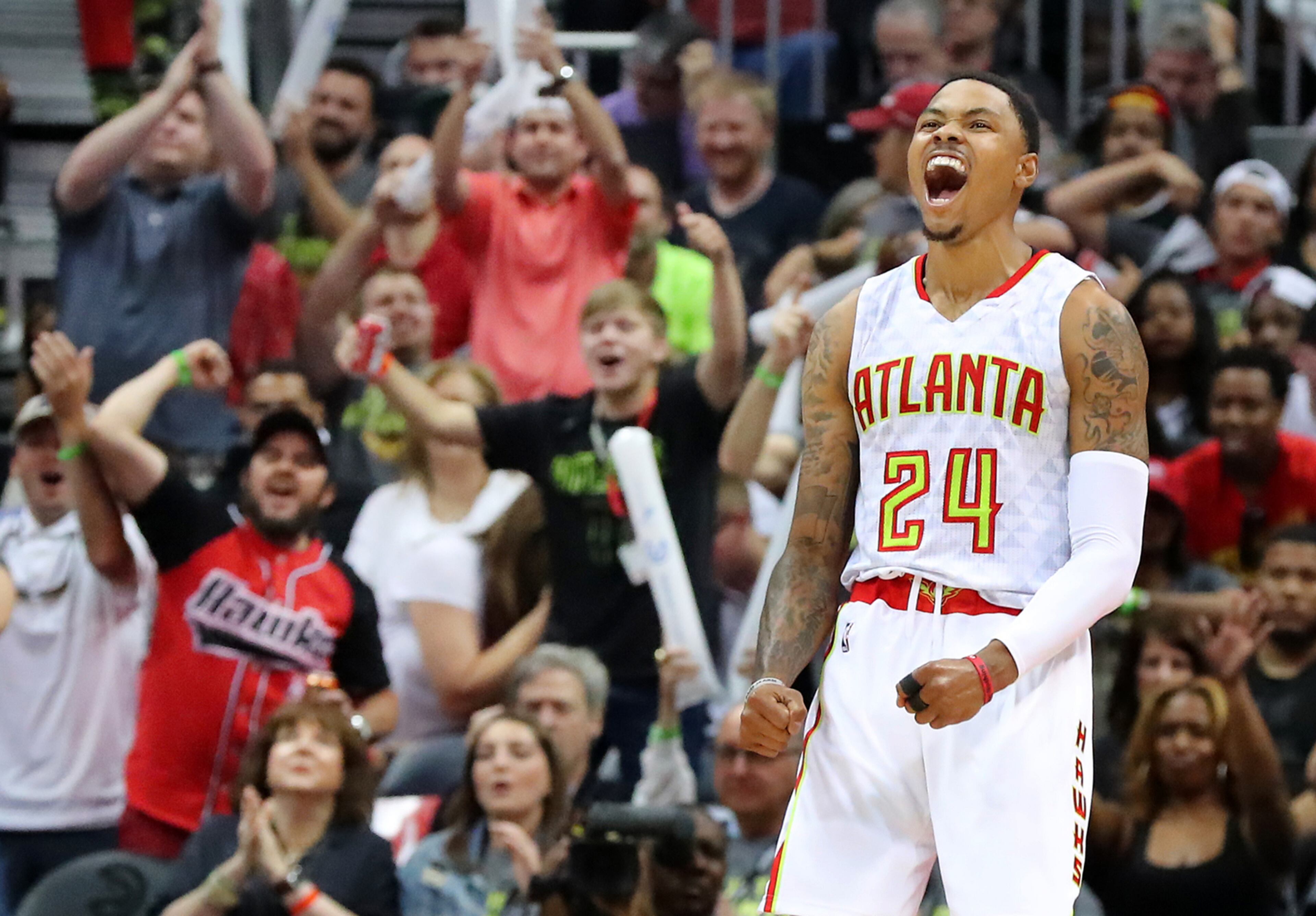 April 22, 2017, Atlanta: Atlanta Hawks Kent Bazemore and fans celebrate as he hits a three pointer against the Wizards during a 116-98 victory in game 3 of a first-round NBA basketball playoff series on Saturday, April 22, 2017, in Atlanta. Curtis Compton/ccompton@ajc.com