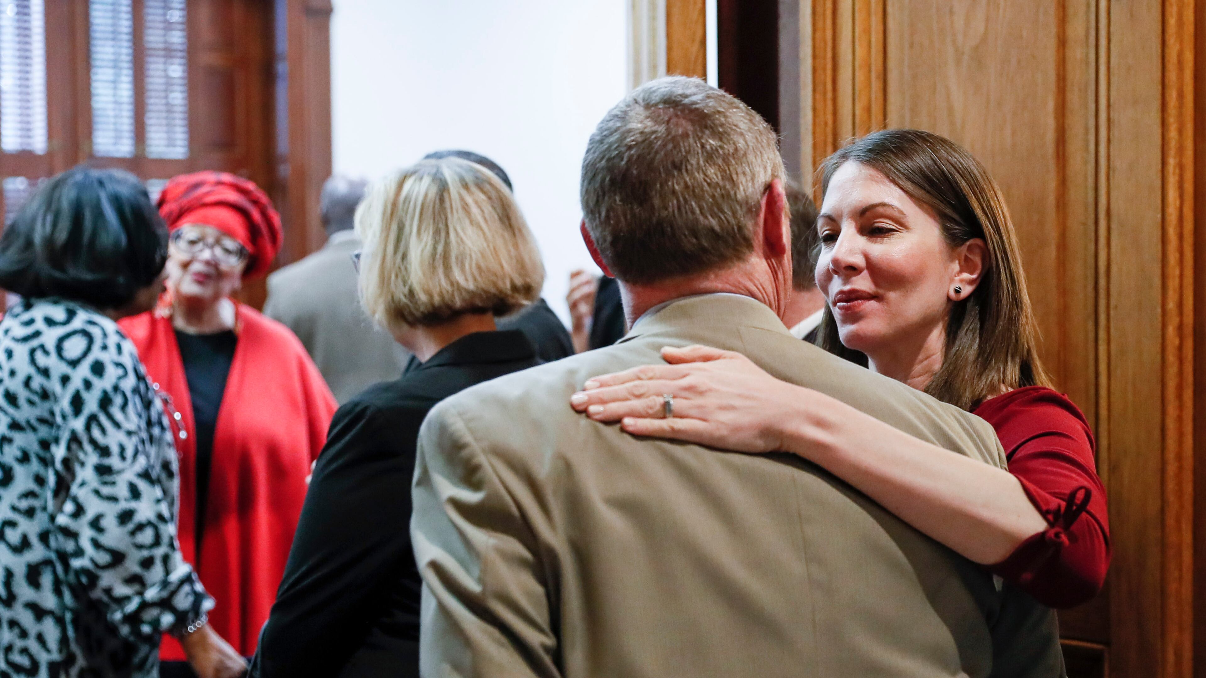 March 2, 2020 - Atlanta - Former state representative and candidate for governor Stacey Evans greets Democratic colleagues in line for qualifying. She is running for representative in district 57. A large turnout by both Democrats and Republicans on the first day of election qualifying resulted in long lines of politicians waiting to sign in. Bob Andres / robert.andres@ajc.com