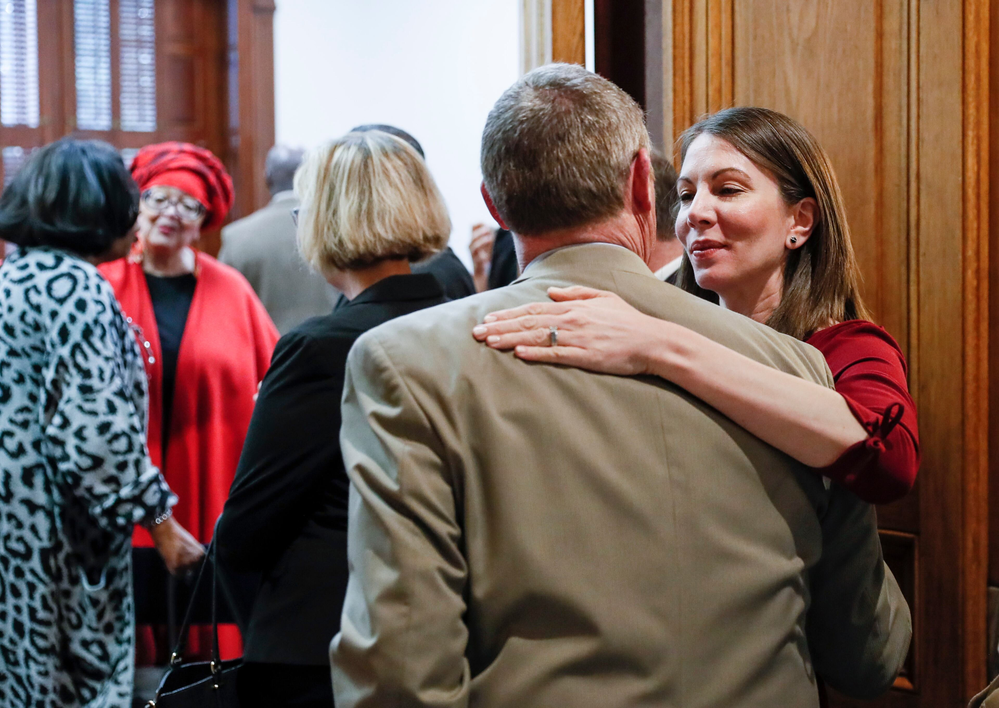 March 2, 2020 - Atlanta - Former state representative and candidate for governor Stacey Evans greets Democratic colleagues in line for qualifying. She is running for representative in district 57. A large turnout by both Democrats and Republicans on the first day of election qualifying resulted in long lines of politicians waiting to sign in. Bob Andres / robert.andres@ajc.com
