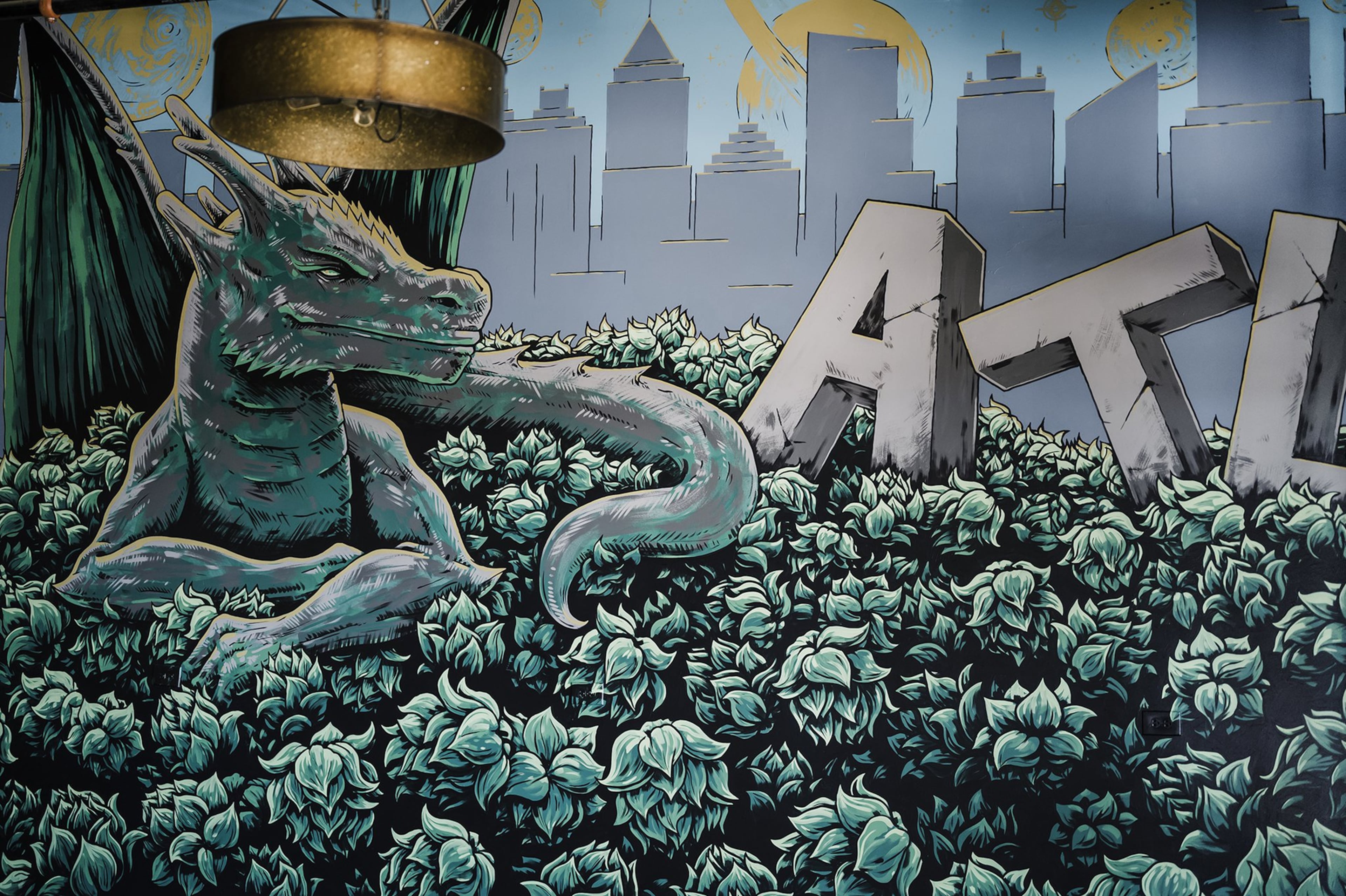 A mural by artist Jordan Atkinson features the Fire Maker dragon in Atlanta. CONTRIBUTED BY FIRE MAKER BREWING CO.