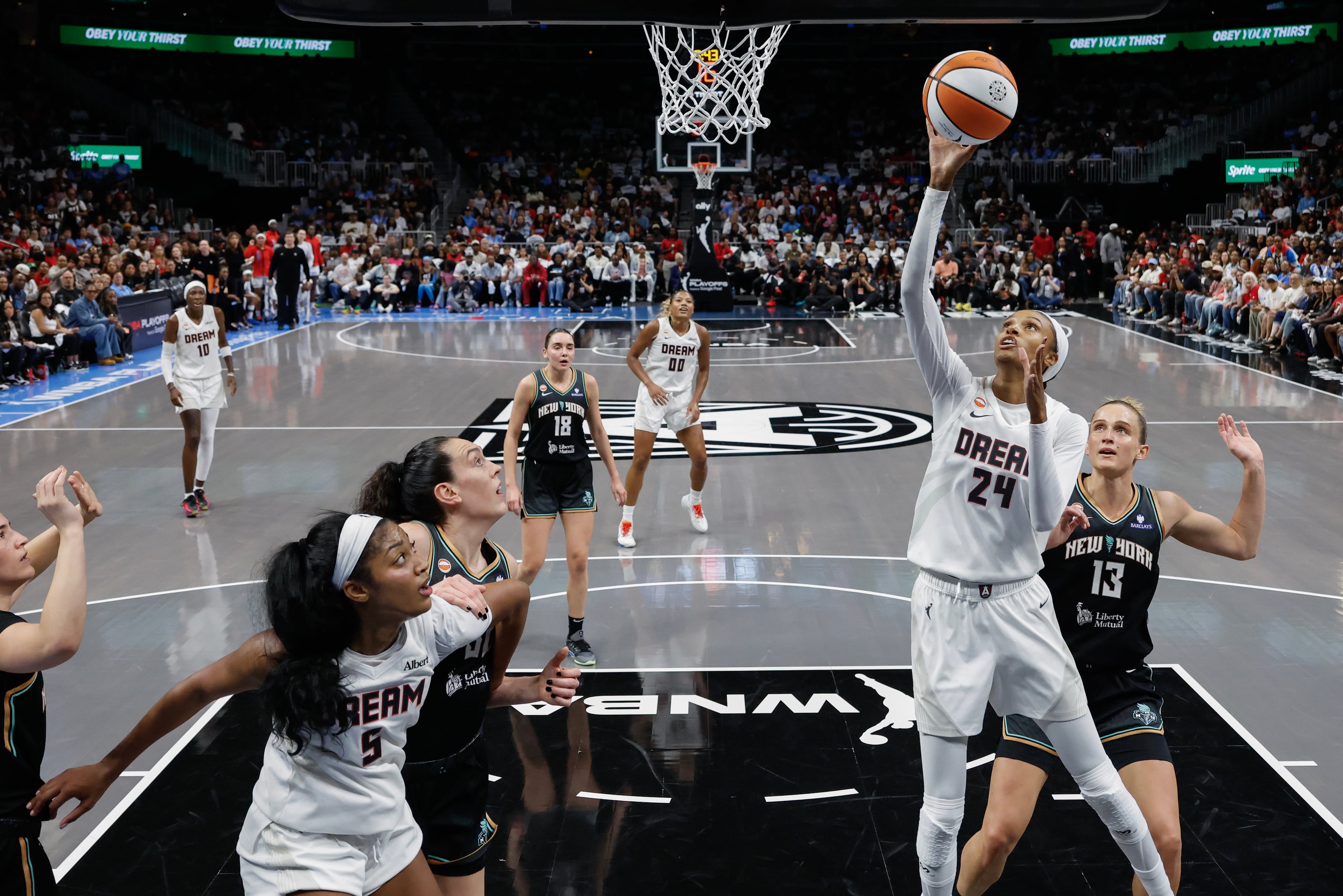 Atlanta Dream forward DeWanna Bonner (24) drives to the basket against the New York Liberty during the first half of a WNBA semifinal playoff game 1 between the Atlanta Dream and the New York Liberty, Sunday, Oct. 4, 2026, in Atlanta. (Erik S. Lesser for the AJC)