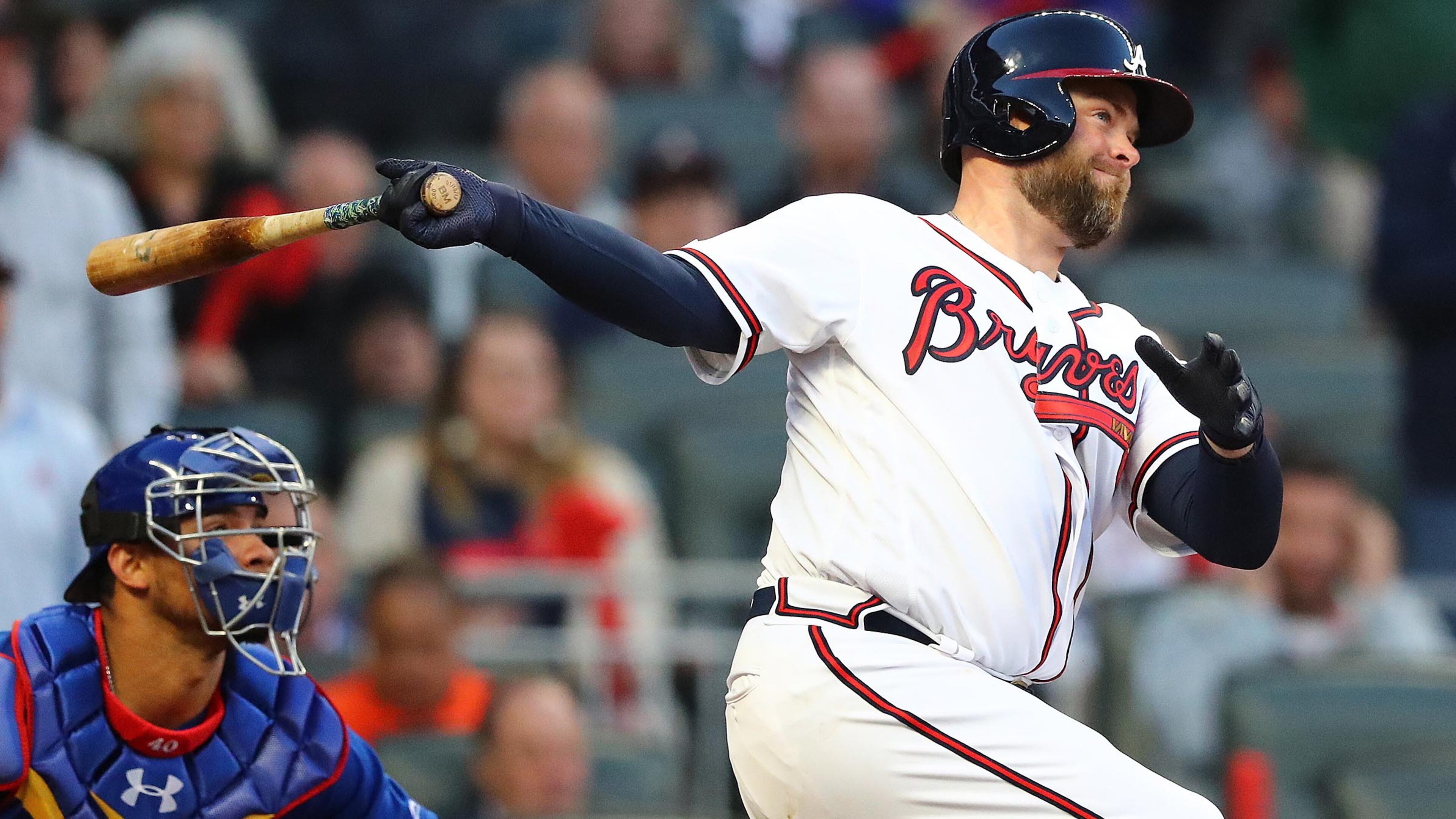 Braves catcher Brian McCann hits a 2-RBI single against the Chicago Cubs to take a 4-0 lead during the first inning of the home opener Monday, April 1, 2019, at SunTrust Park in Atlanta.