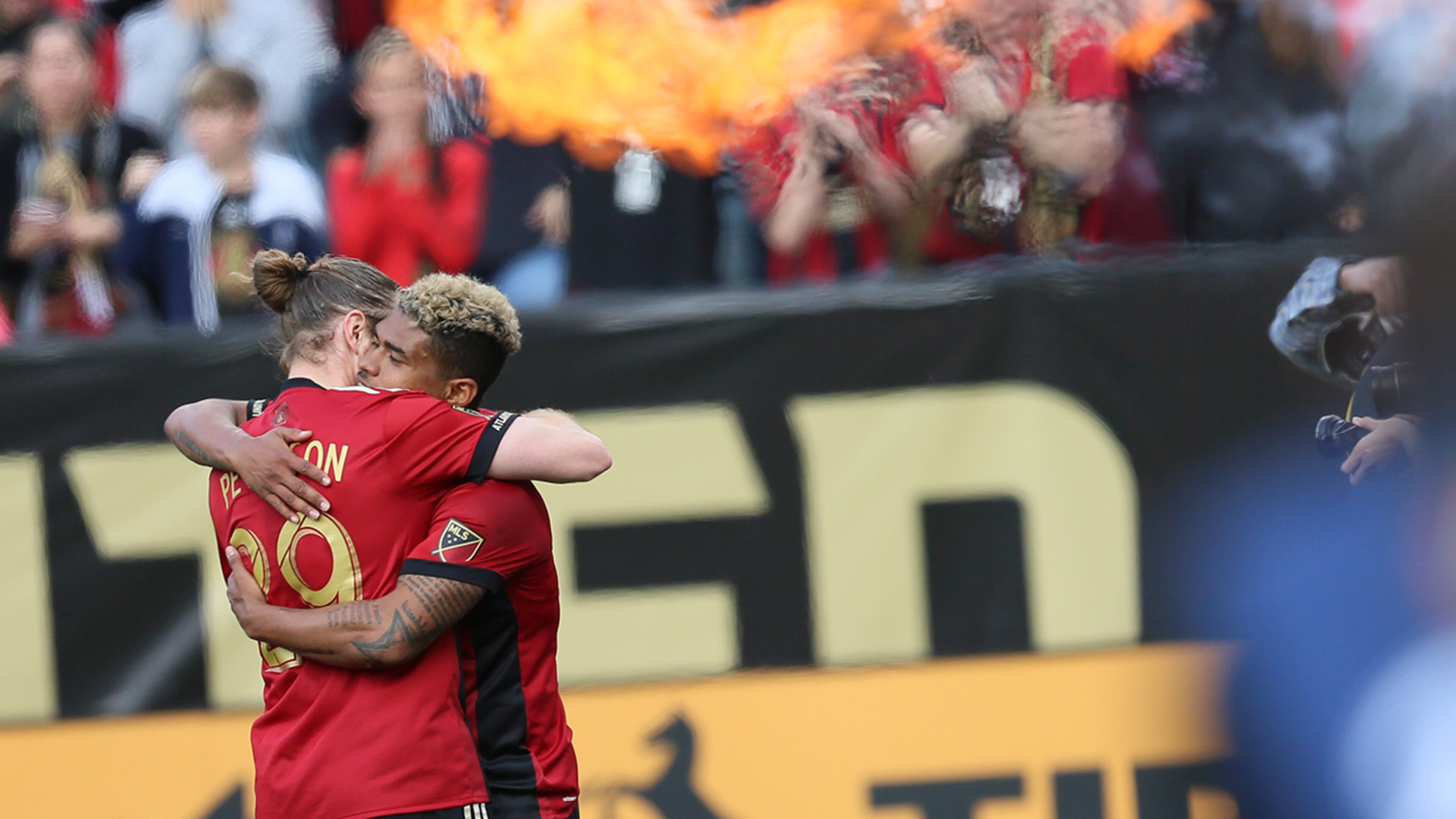 Look! They are so happy that I've got a soccer blog they are hugging.