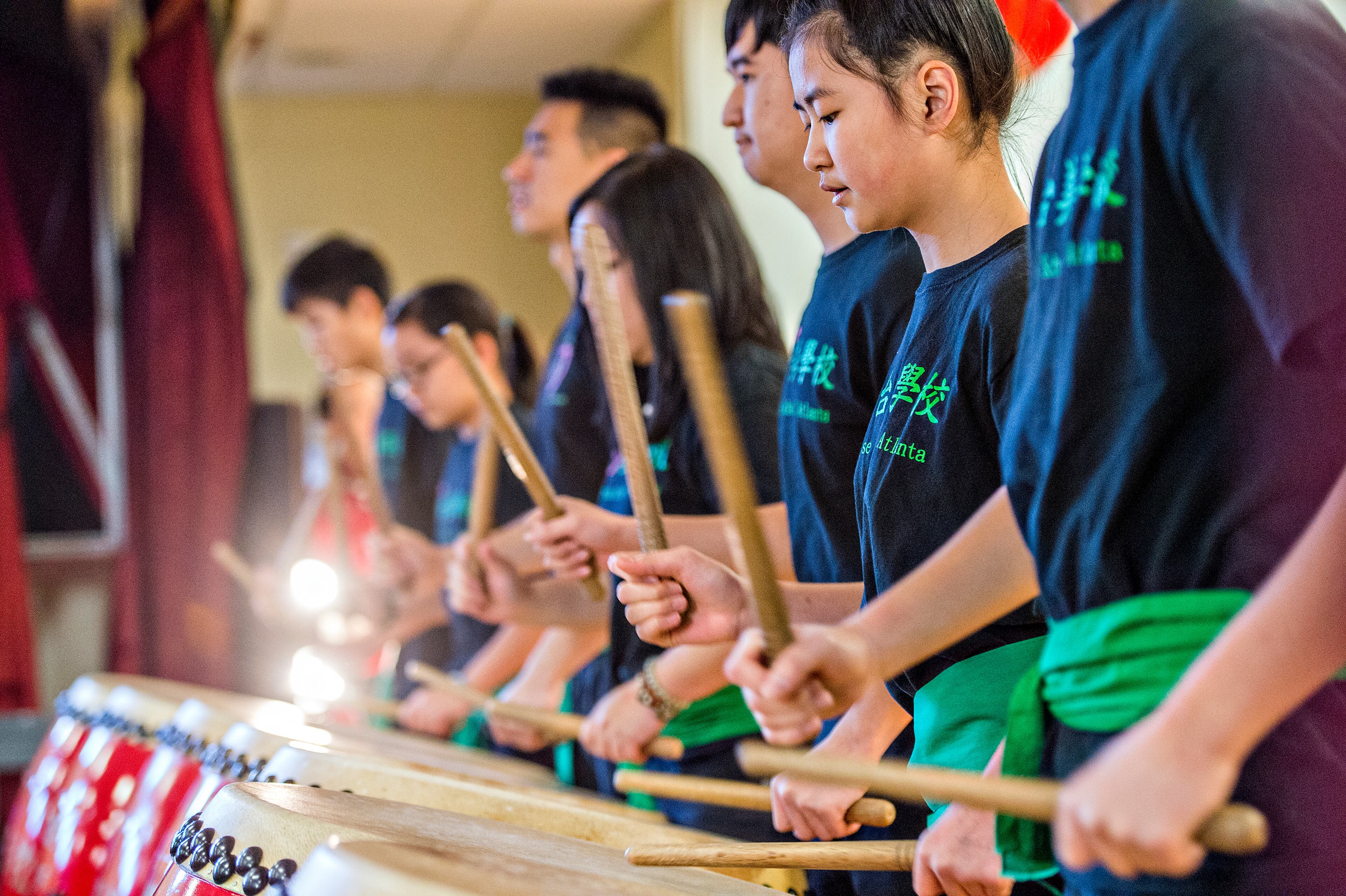 Grace Liu (right) plays the drums during the Atlanta Chinese Lunar New Year Festival in Chamblee on Saturday, February 13, 2016. Thousands of people came out to ring in the year of the monkey with food, performances and more. JONATHAN PHILLIPS / SPECIAL