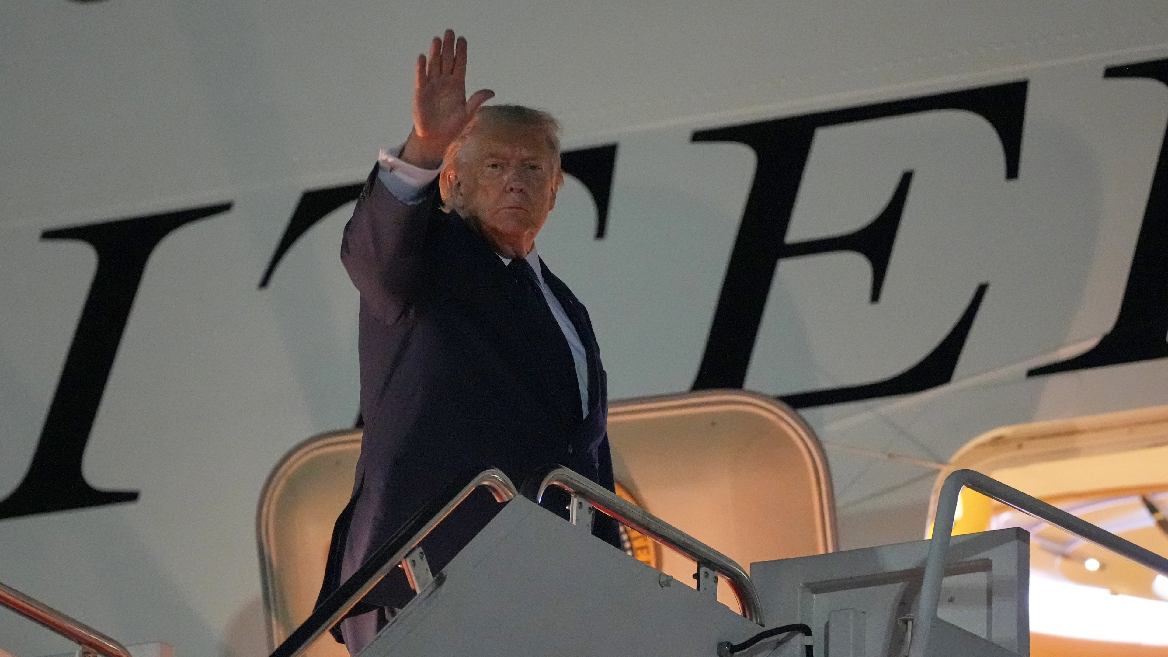 President Donald Trump waves as he boards Air Force One, Monday, July 6, 2026, at Joint Base Andrews, Md. (AP Photo/Alex Brandon)