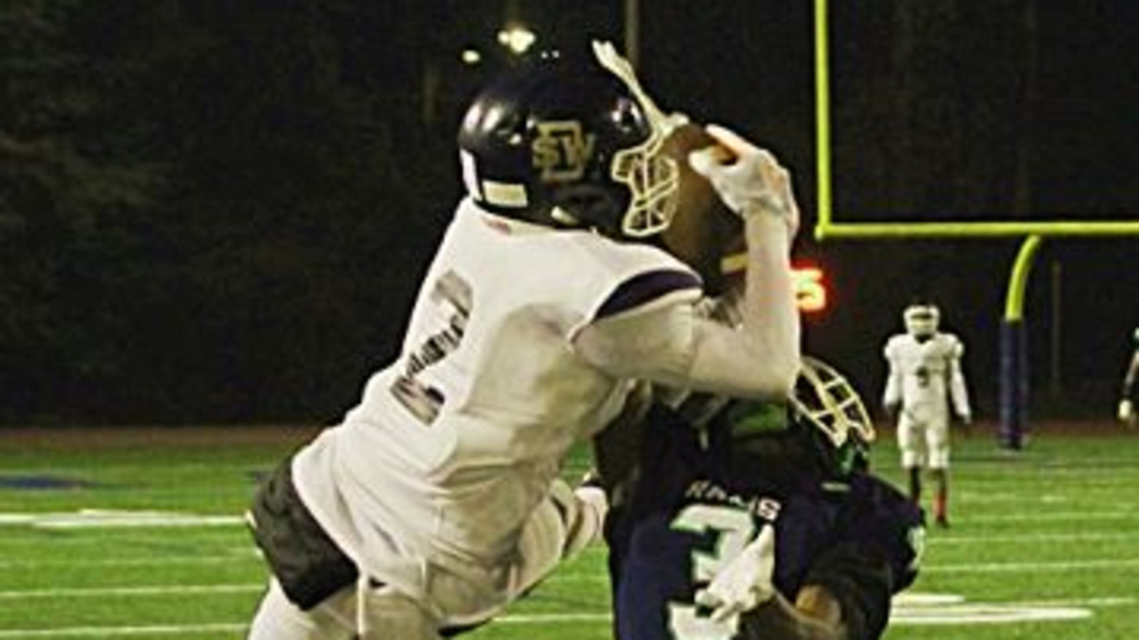 Southwest DeKalb’s Aquil Muhammad makes a great catch against Arabia Mountain. (Photo - Mark Brock)
