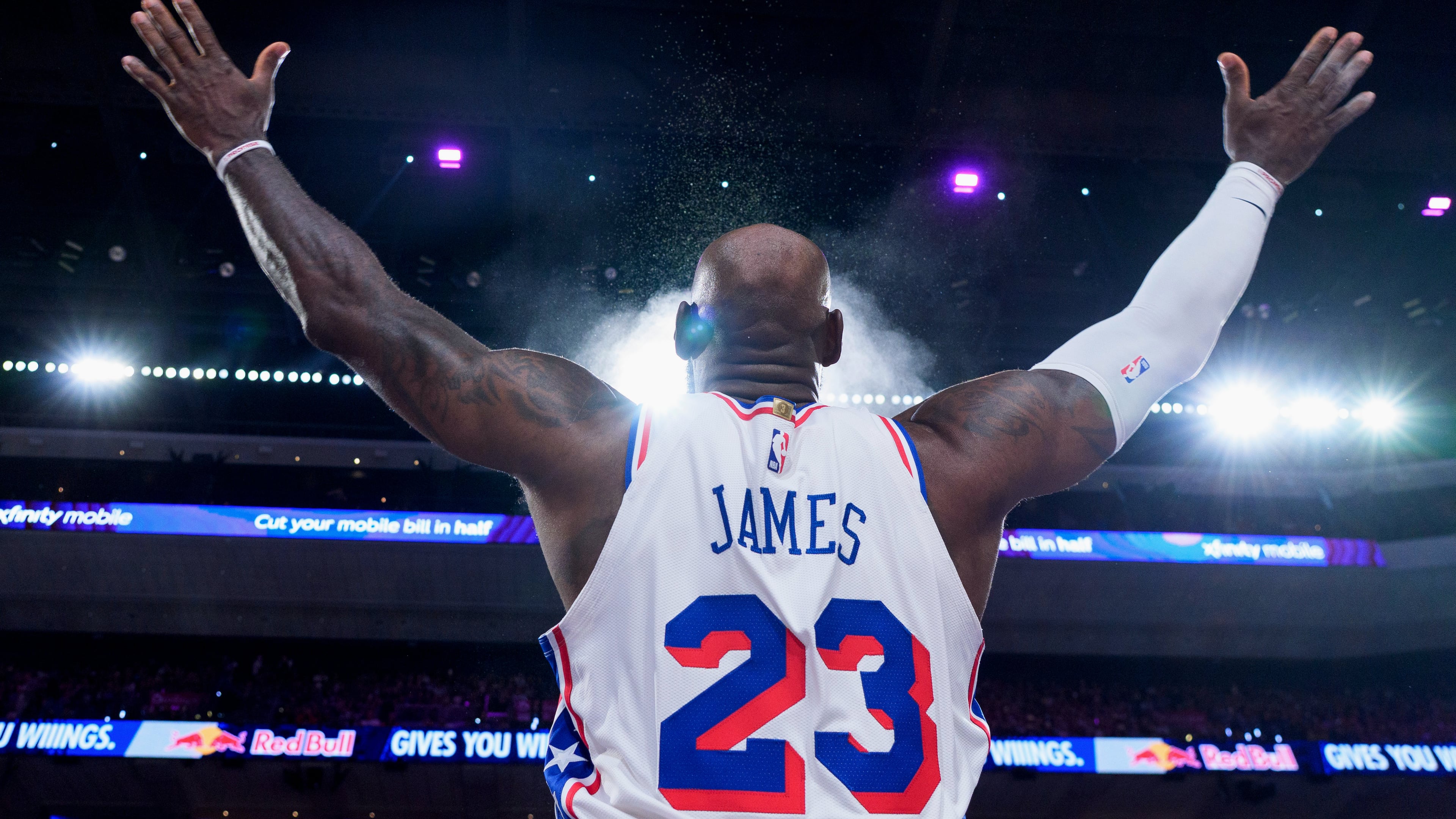 Philadelphia 76ers' LeBron James tosses the chalk in the air ahead of the first half of an NBA basketball game against the Detroit Pistons, Sunday, Oct. 25, 2026, in Philadelphia. (AP Photo/Chris Szagola)