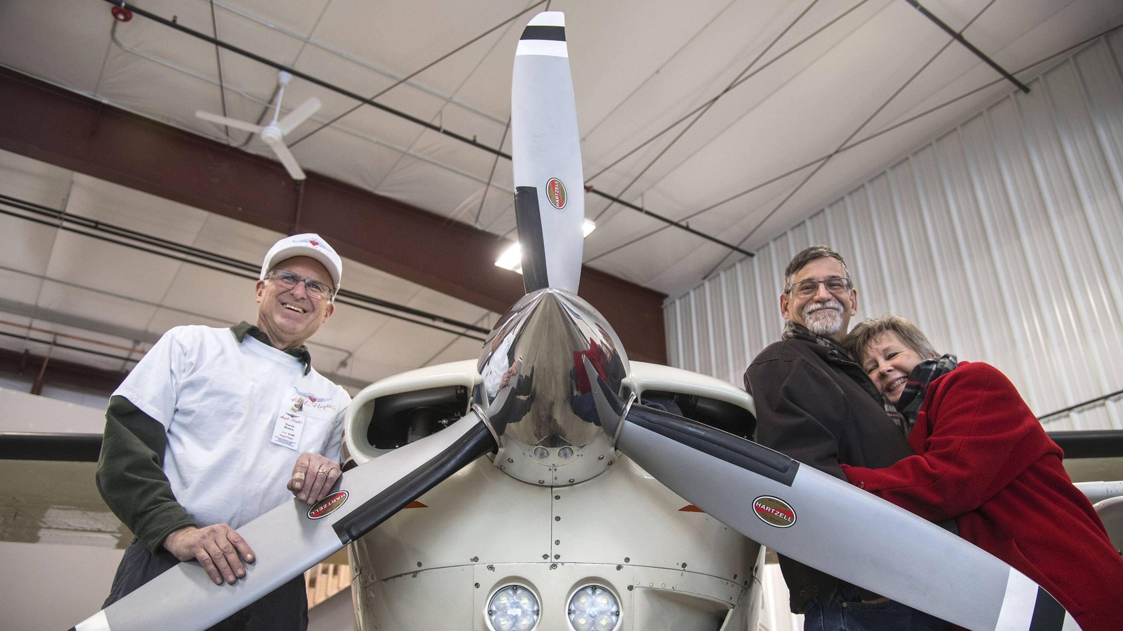 Bob Proctor and his wife, Lee, right, live north of Spirit Lake and have to travel often to Seattle for his regular cancer treatments and follow-up doctor visits. They tried driving but with health and weather, that got to be overwhelming, so they started booking on Alaska Airlines. When that became cost-prohibitive, they learned about the nonprofit Angel Flight West, where volunteer pilots in small aircraft take patients at no cost. The Proctors traveled Dec. 13 over to Seattle with Norris Brown, left, a pilot who lives in Spokane Valley. (Dan Pelle/The Spokesman-Review/TNS)