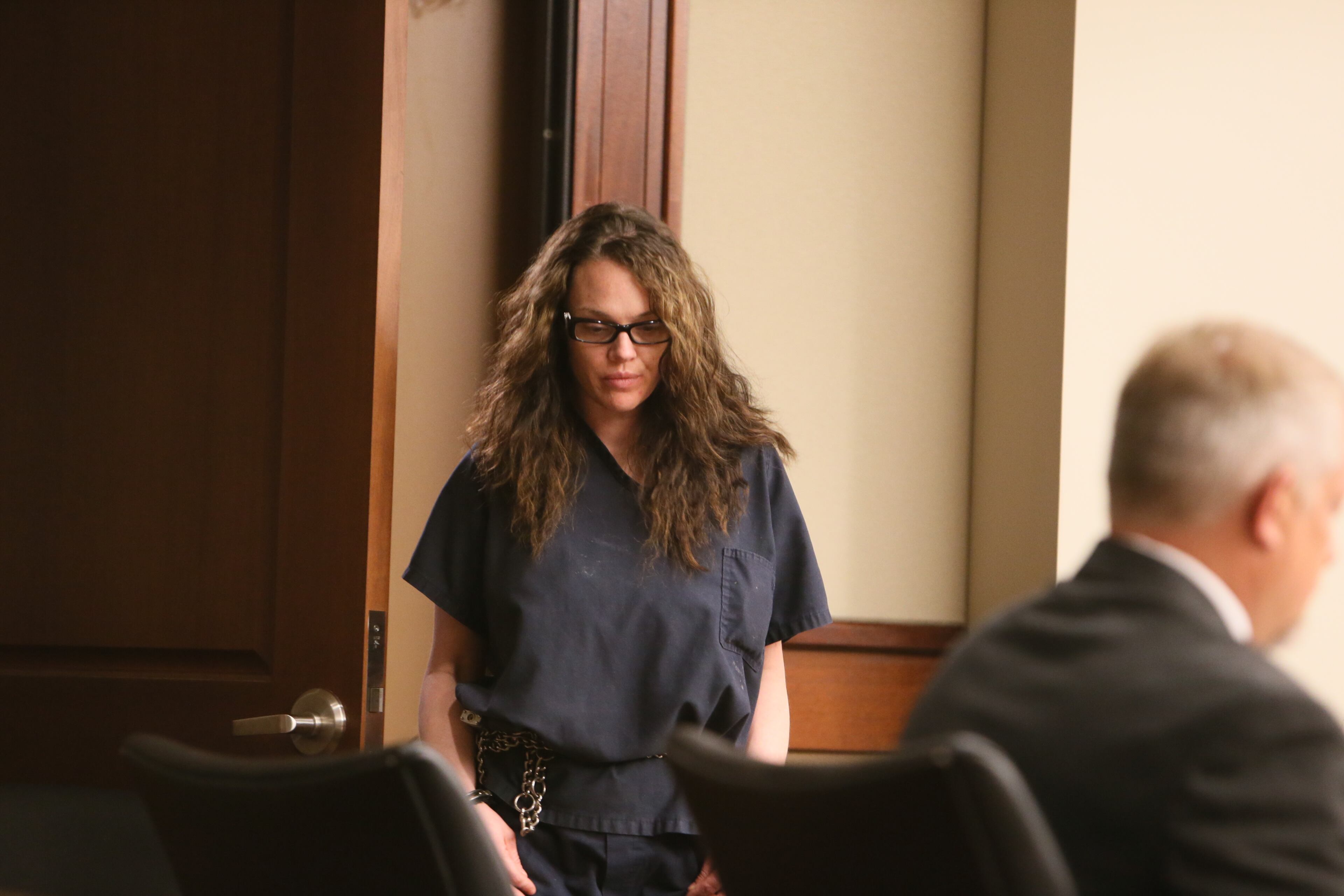In a navy jail suit, Anna Benson, 37, sat quietly Thursday afternoon in Cobb County Superior Court as her attorney asked Judge LaTain Kell to grant $50,000 bond, along with numerous stipulations, including psychological evaluation and treatment. Benson has been in jail since July 7, when she was arrested after allegedly threatening her husband, armed with several weapons, at his Smyrna home.